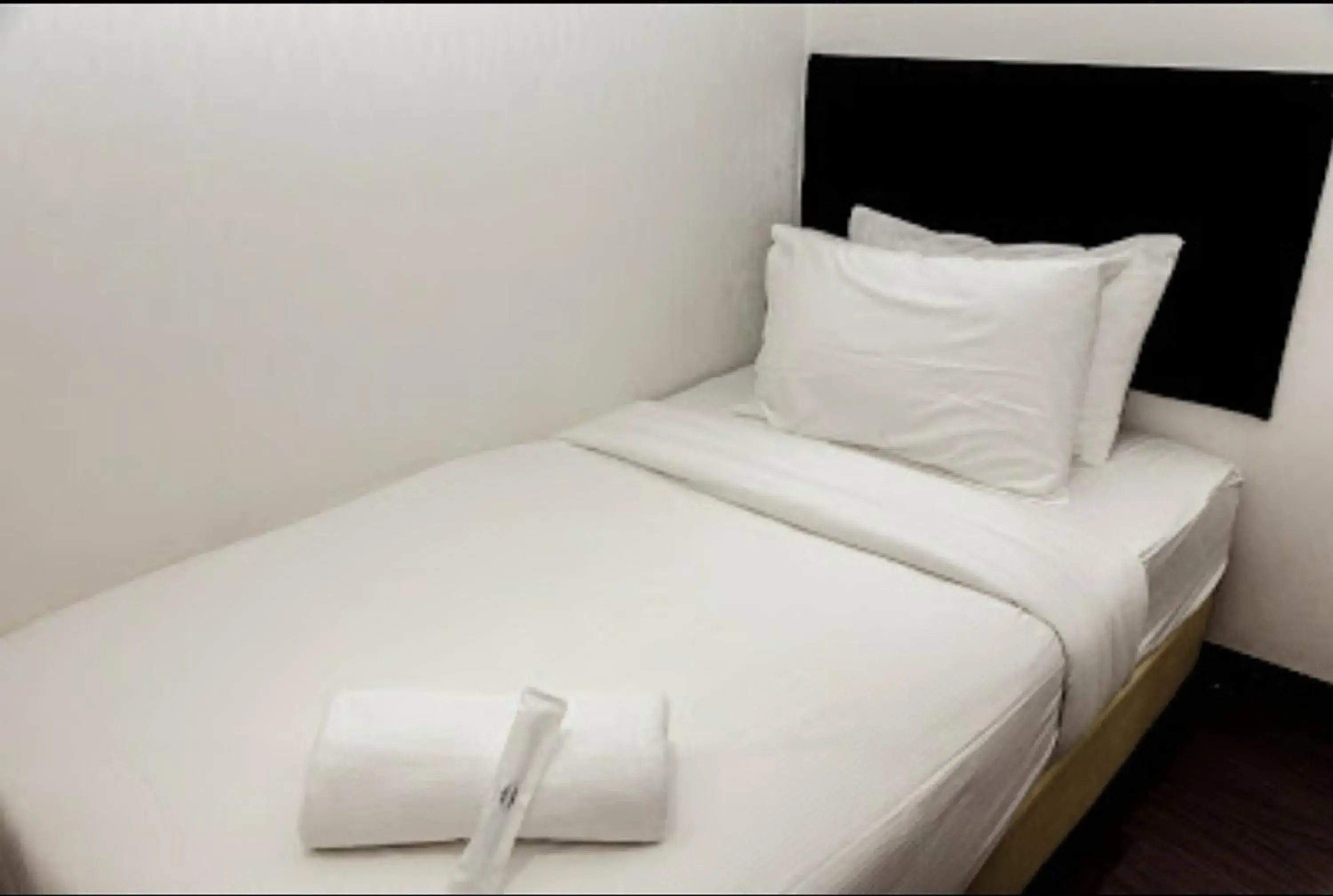 Bed in Vivids Hotel