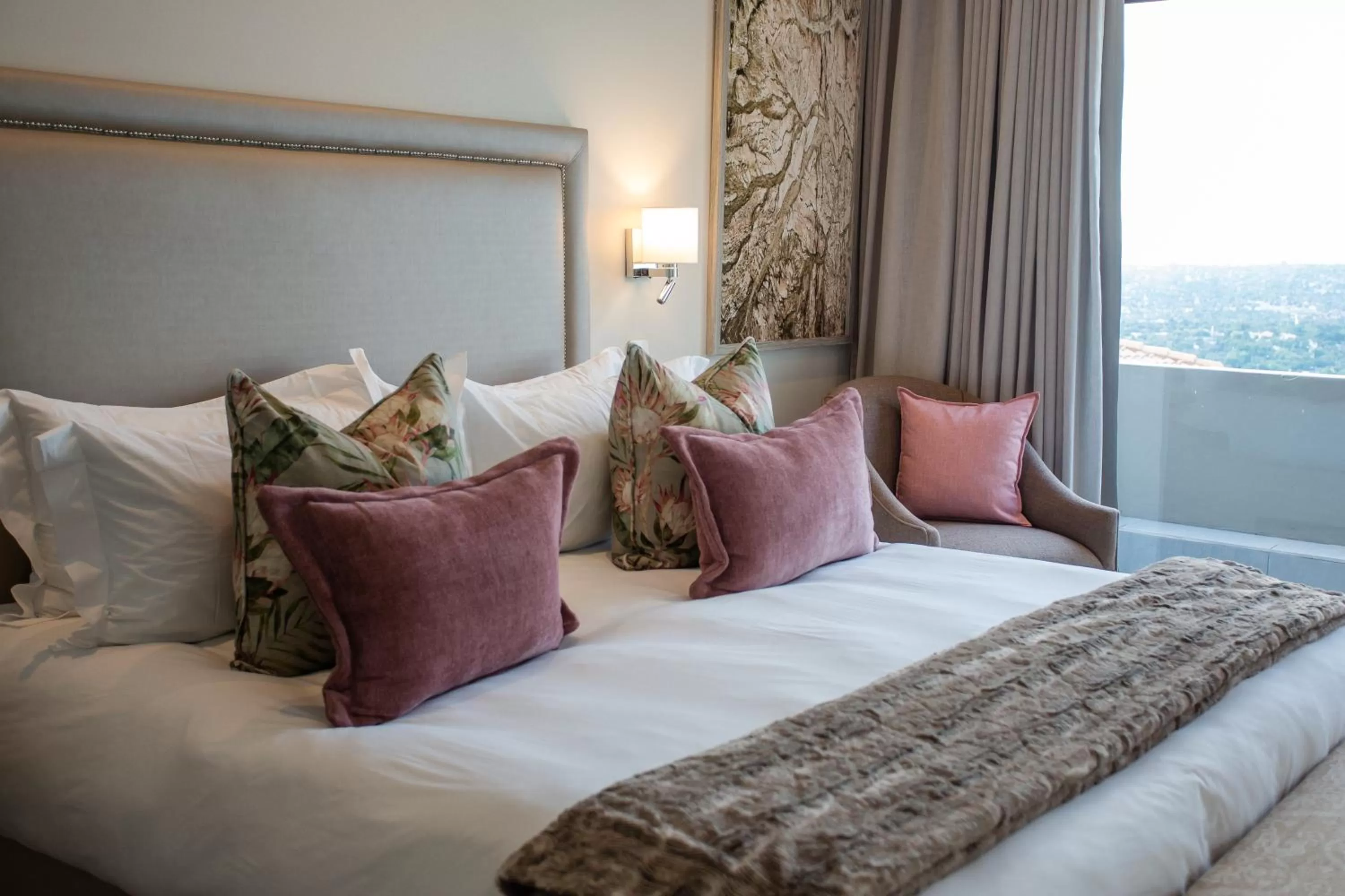 Bed in The Northcliff Boutique Hotel