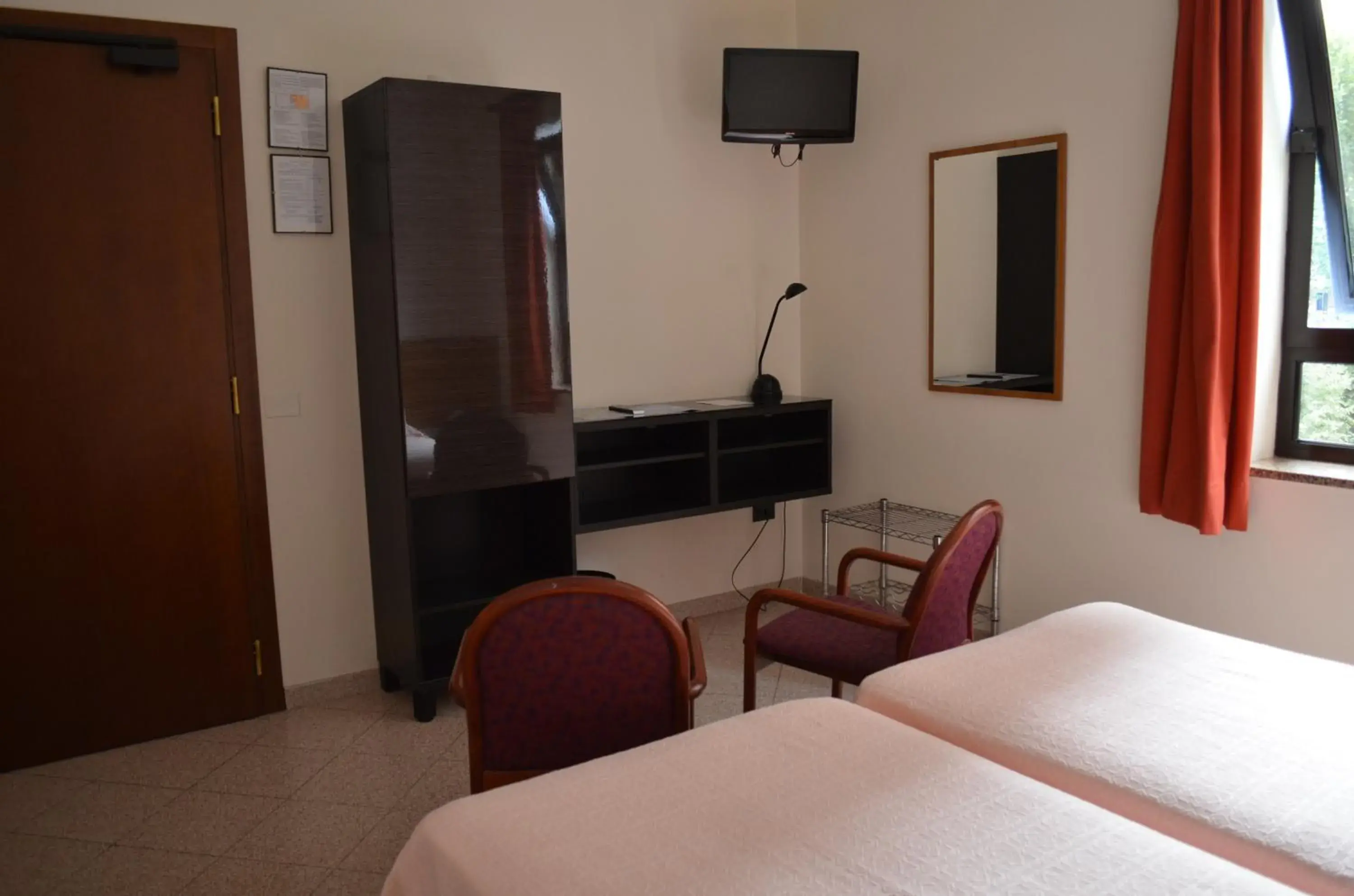Photo of the whole room, TV/Entertainment Center in Hotel Adria