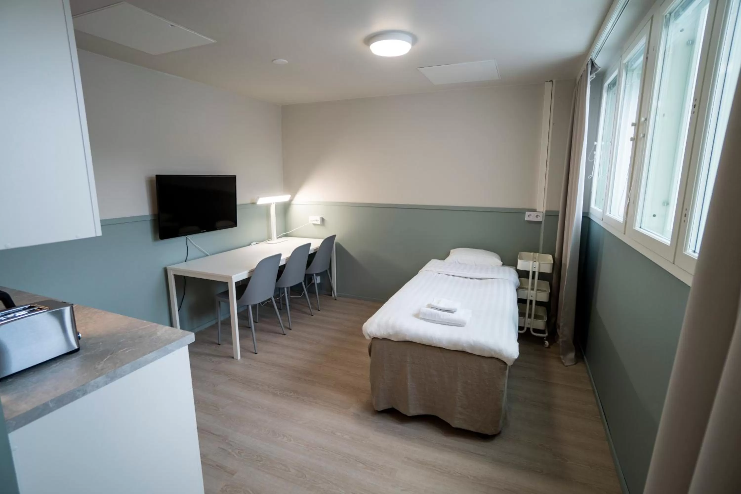 TV and multimedia, Bed in Innotelli Apartments