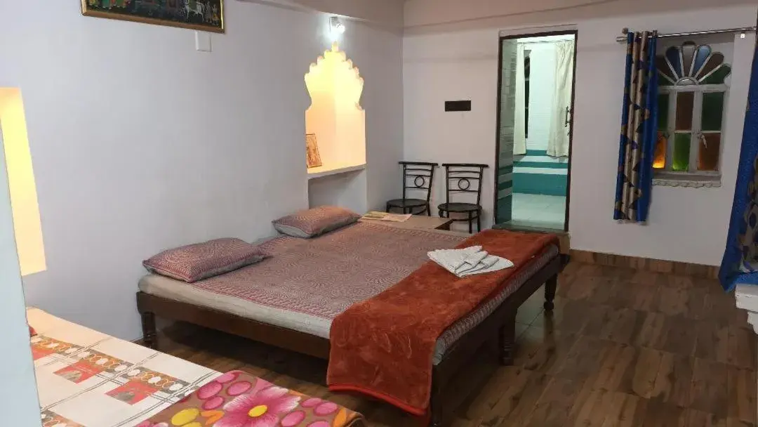 Photo of the whole room, Bed in Jag Niwas Guest House & pure veg restaurant Photo of the whole room, Bed in Jag Niwas Guest House & pure veg restaurant
