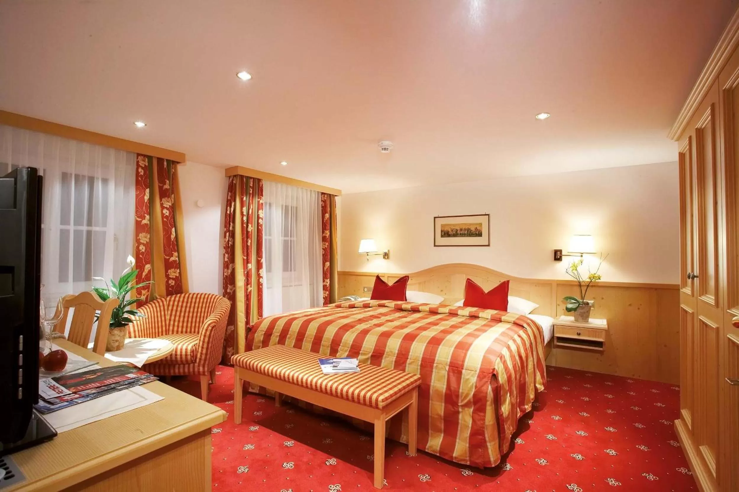 Bed in Hotel Tannbergerhof im Zentrum von Lech