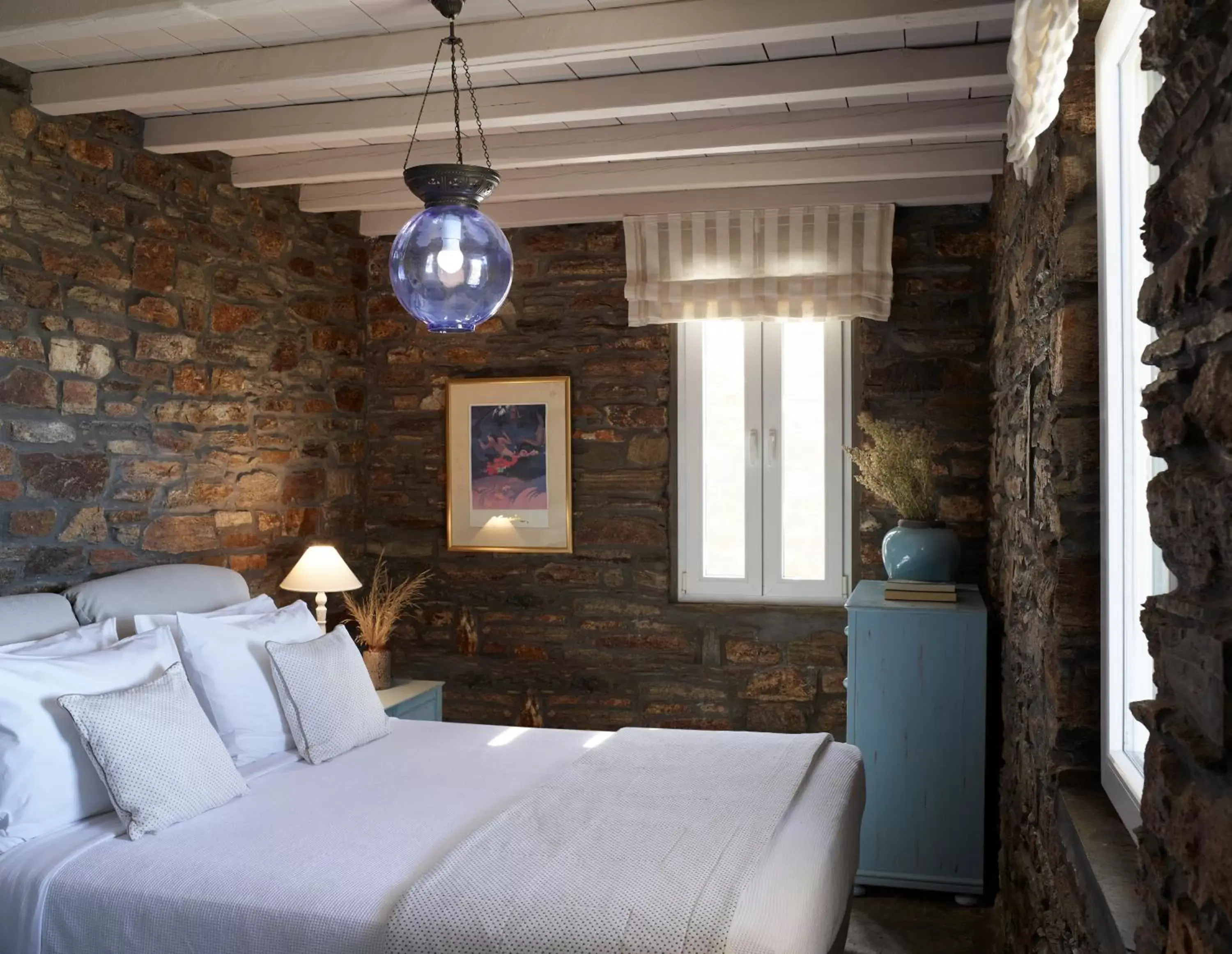 Bed in Aeolis Tinos Suites