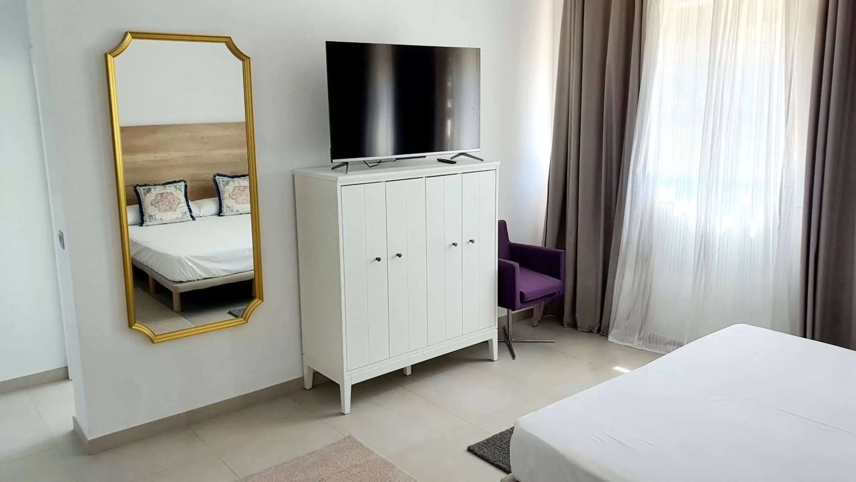 TV/Entertainment Center in Villamartin Hotel GHB