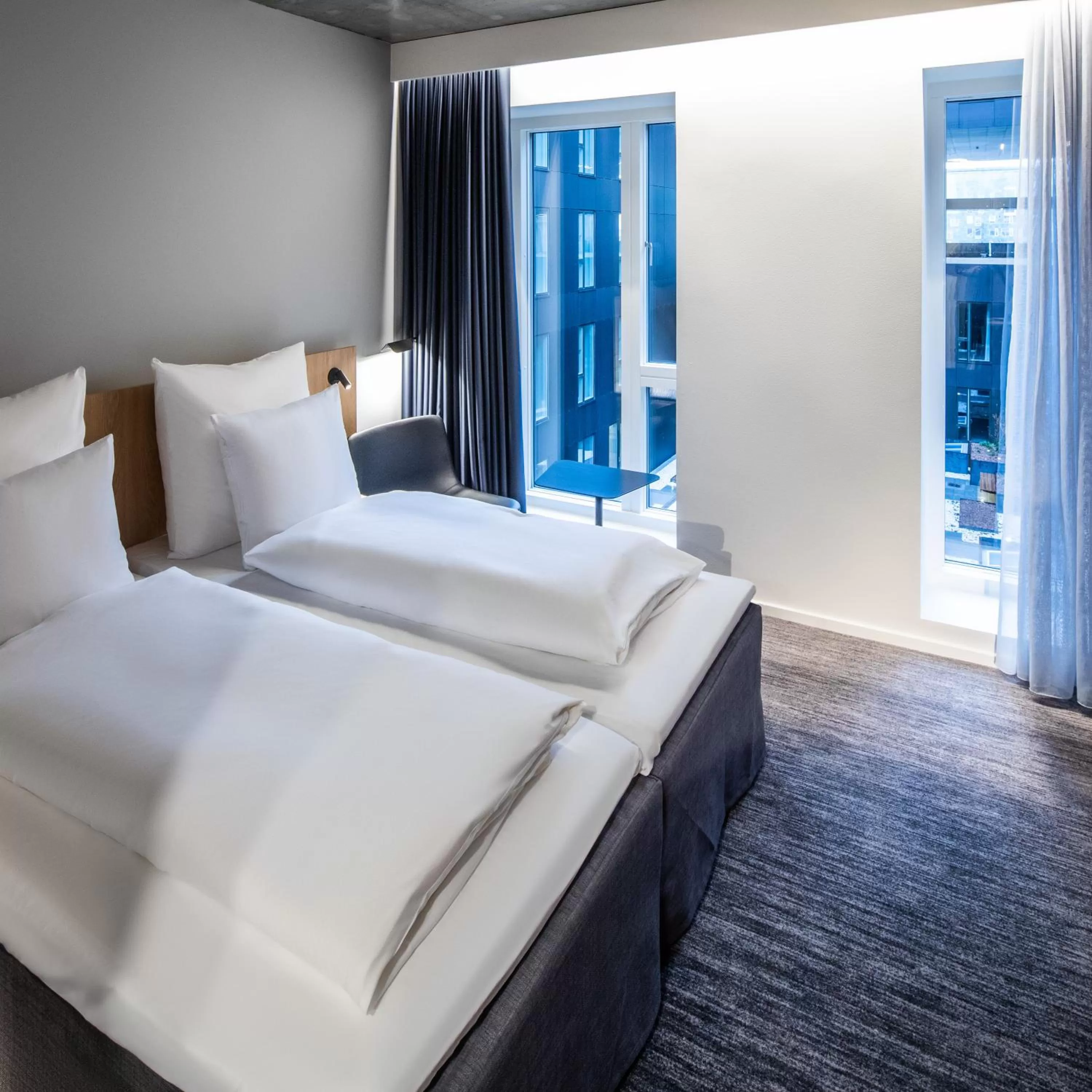 Bed in Comwell Copenhagen Portside Dolce by Wyndham