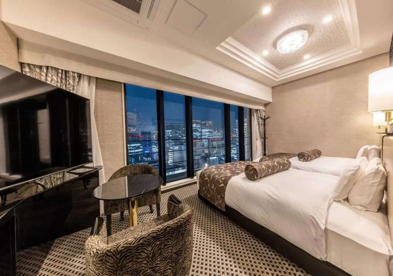 Photo of the whole room, Bed in APA Hotel & Resort Osaka Umeda Eki Tower