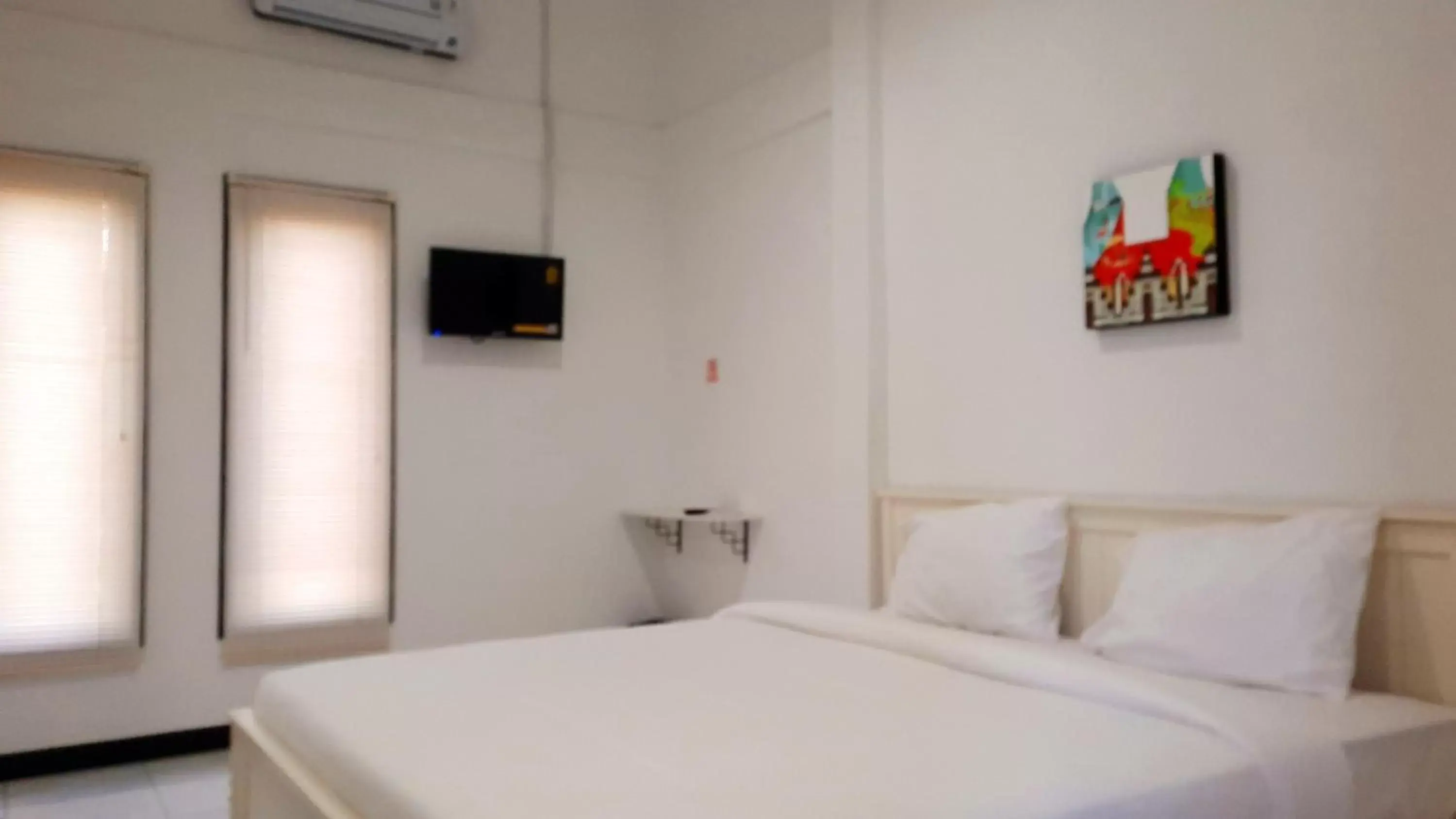 Bed in COZY STAY KUPANG