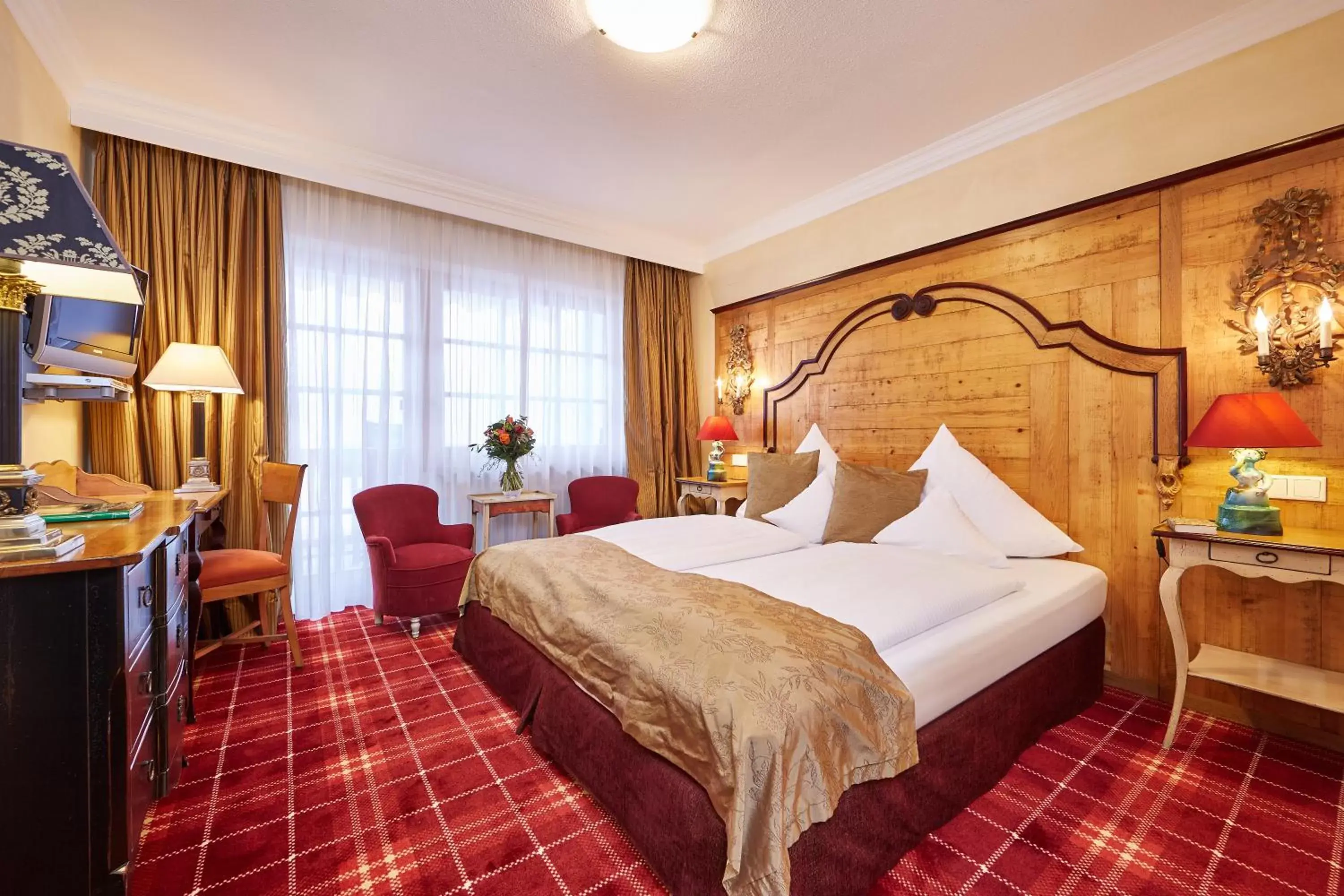 Photo of the whole room, Bed in Romantik Alpenhotel Waxenstein