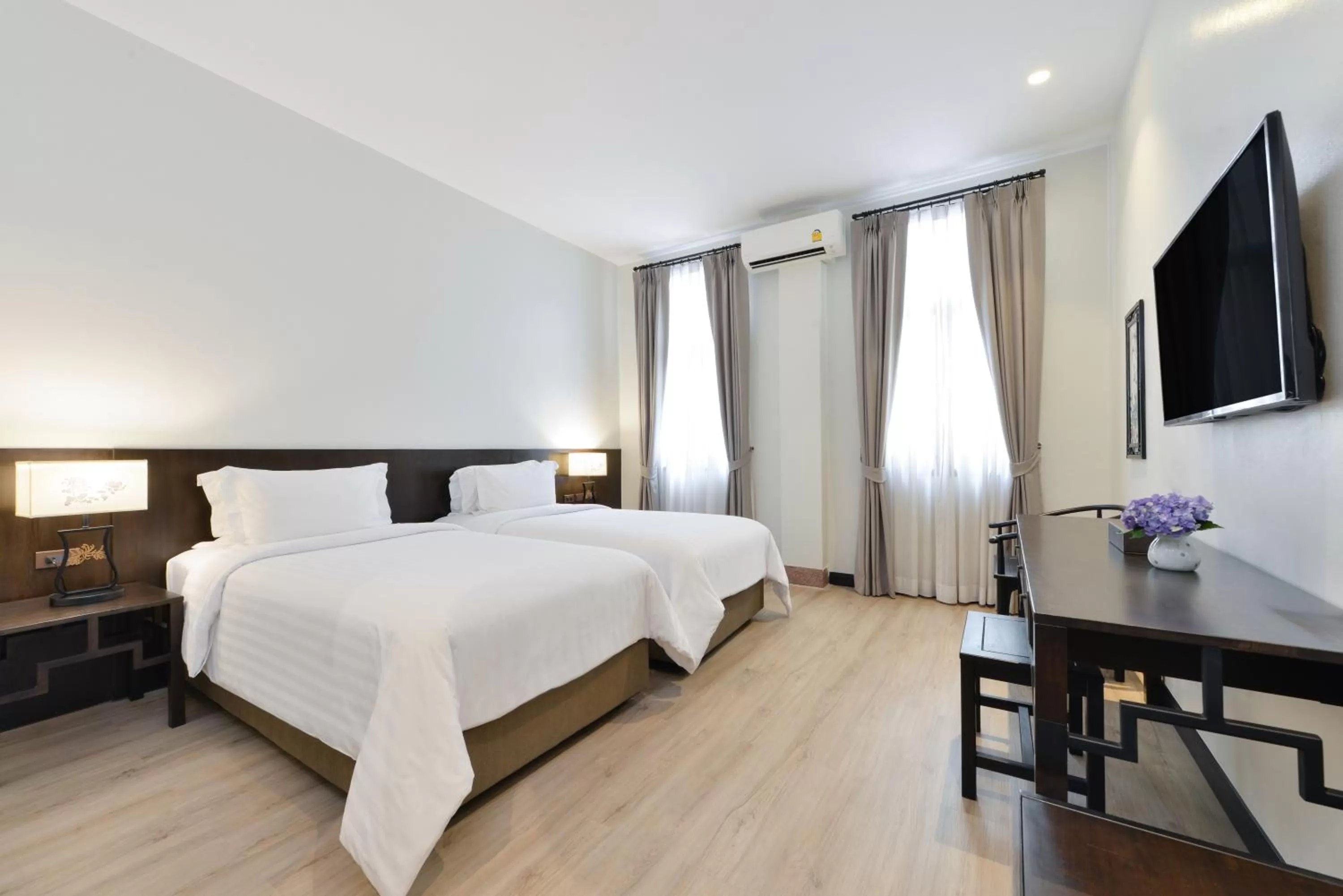 Bed in Oldthaiheng Hotel