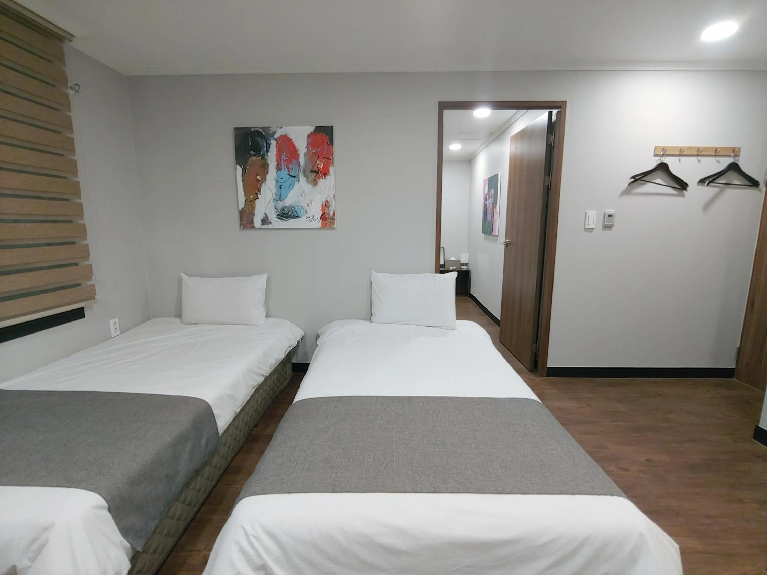 Bed in Hotel Tong Yeondong Jeju