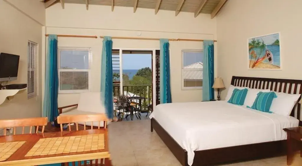 Photo of the whole room, Bed in Grooms Beach Villa & Resort