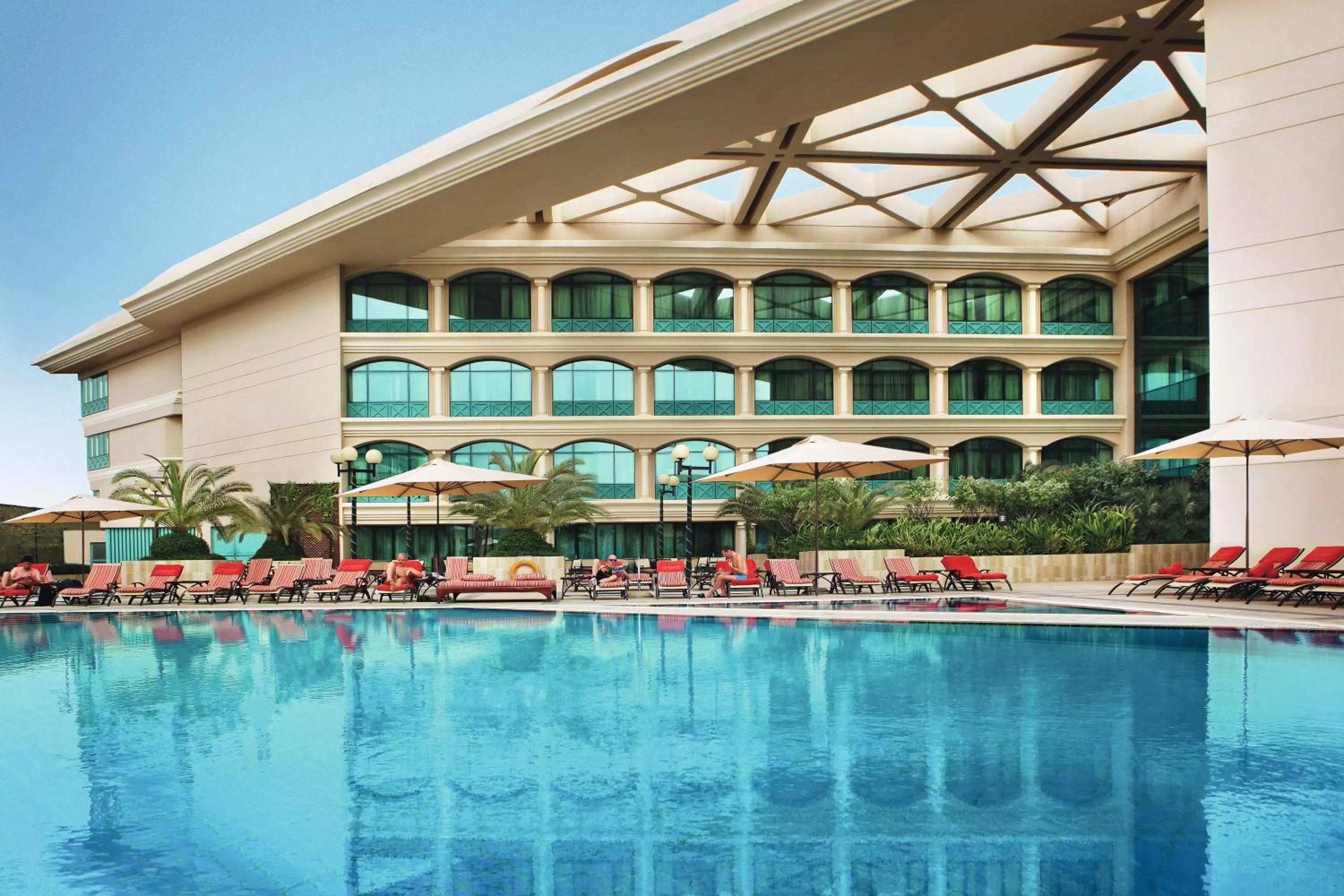 Swimming pool in Mövenpick Grand Al Bustan