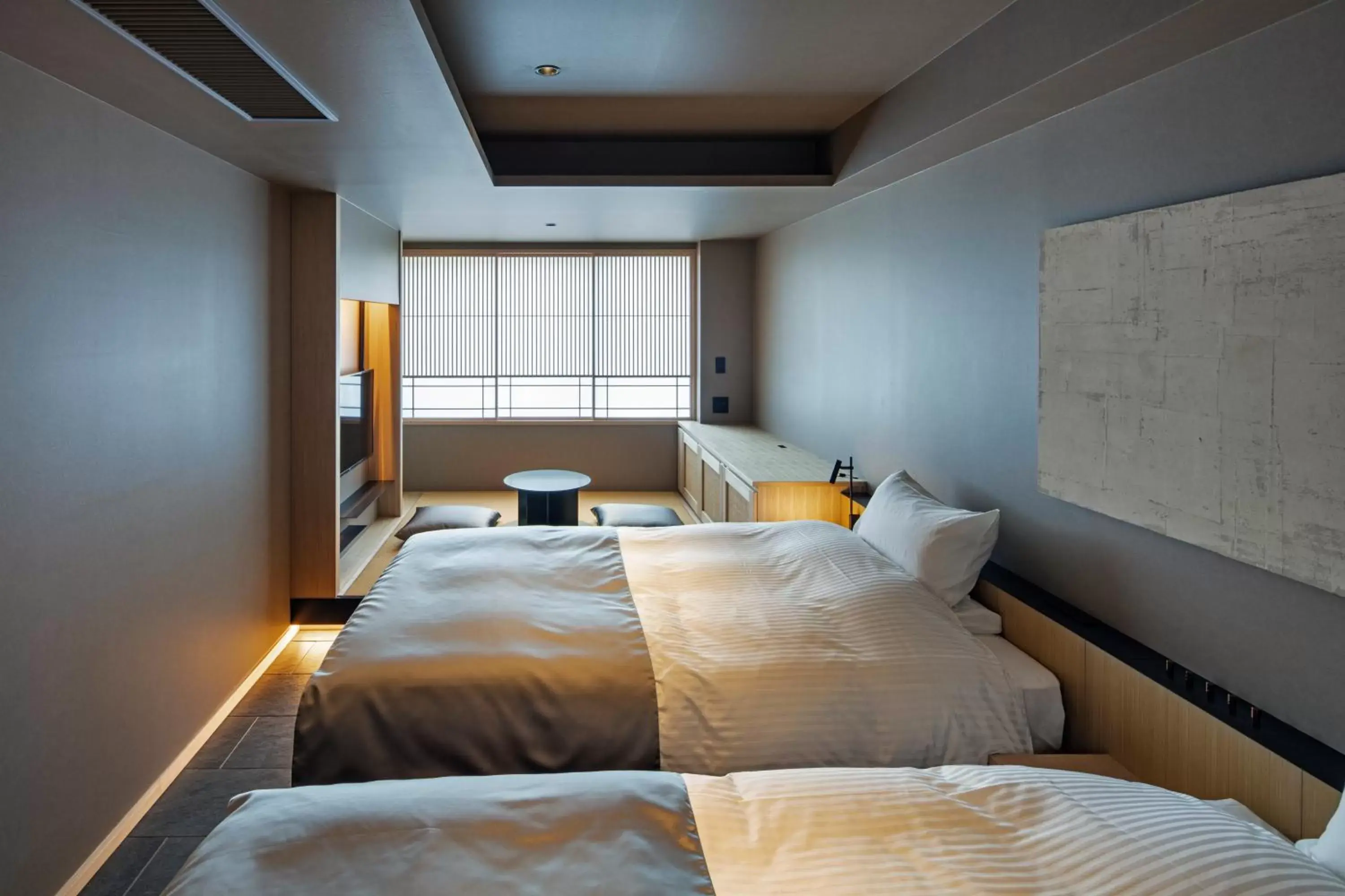 Bed in hotel tou nishinotoin kyoto