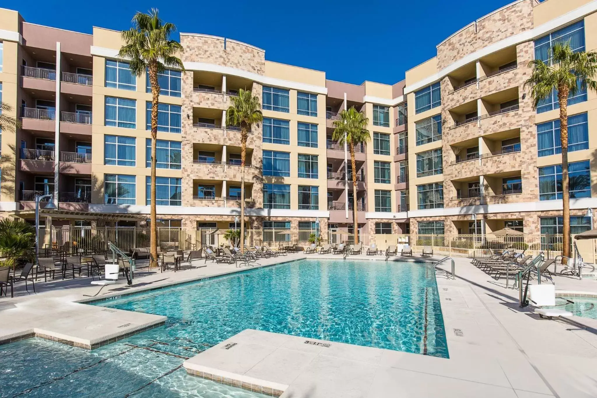Swimming pool, Property Building in Staybridge Suites Las Vegas - Stadium District