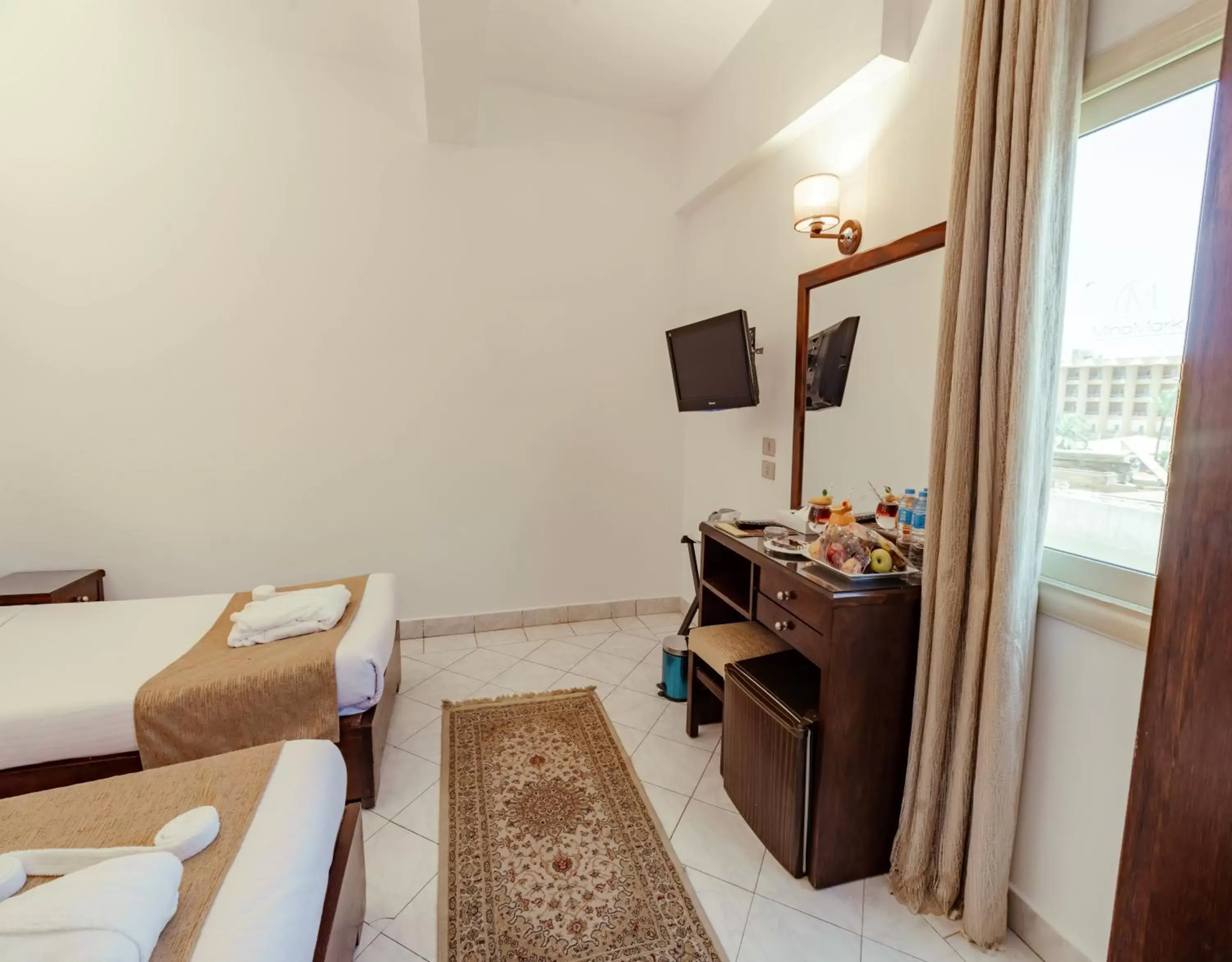 Bedroom in MinaMark Beach Resort for Families and Couples Only