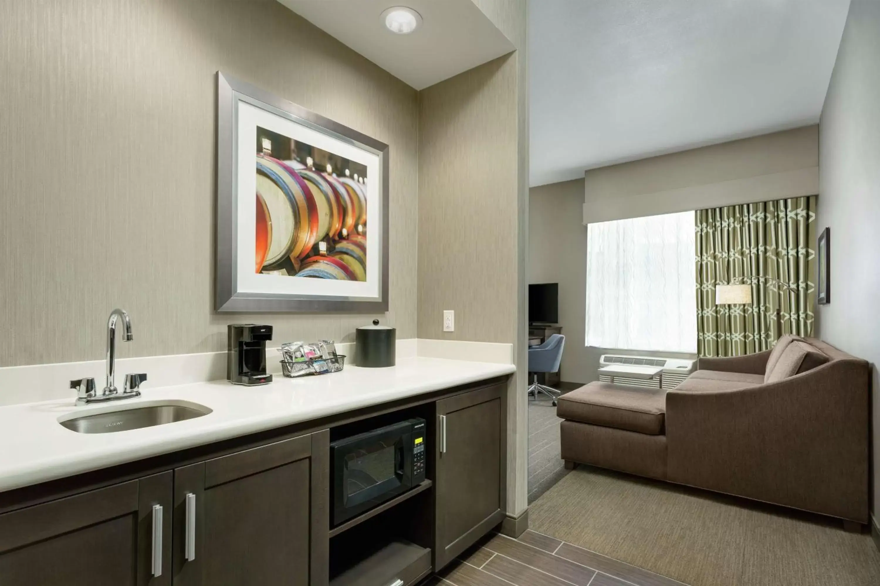 Living room, Kitchen/Kitchenette in Hampton Inn & Suites - Napa, CA