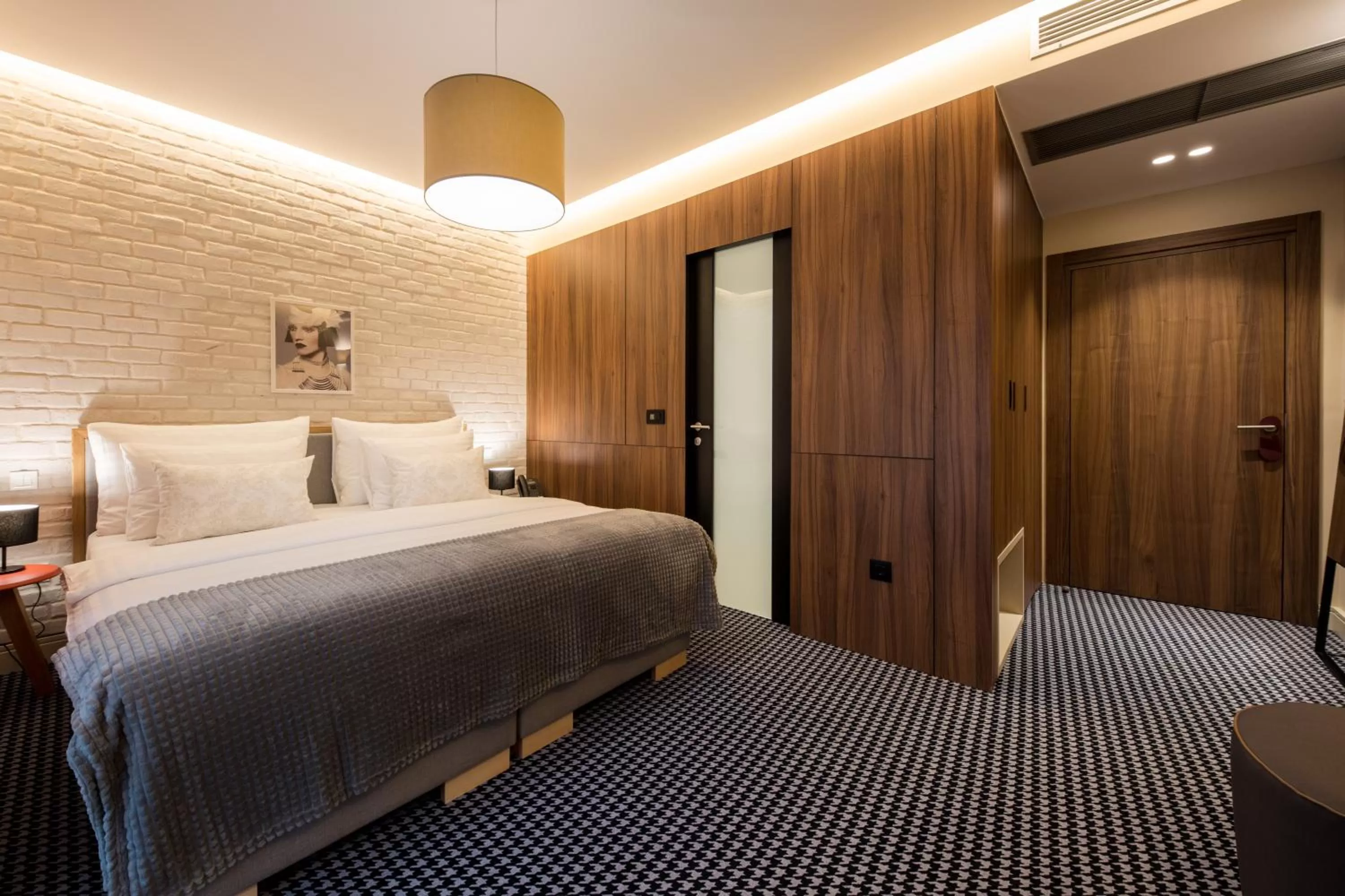 Seating area, Bed in Livris Hotel