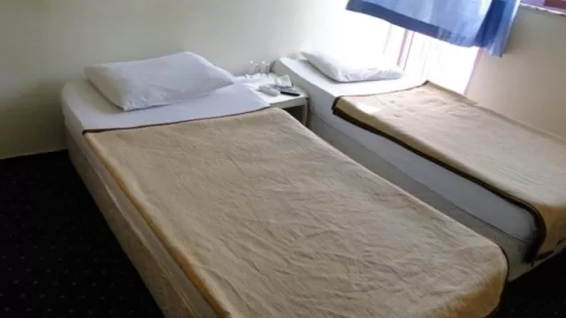 Bed in Sunrise Hotel