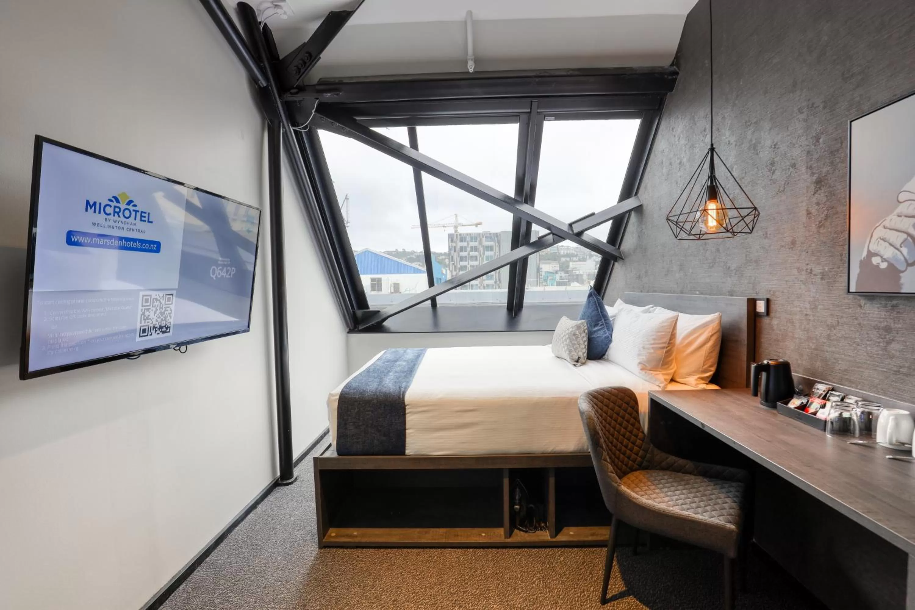 Photo of the whole room, Bed in Microtel by Wyndham Wellington