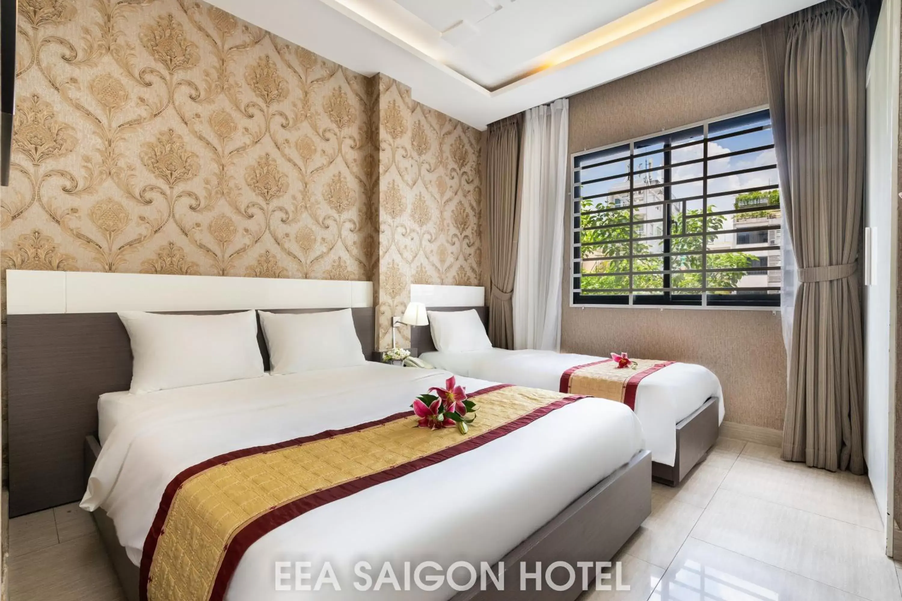 Bed in EEA Central Saigon Hotel