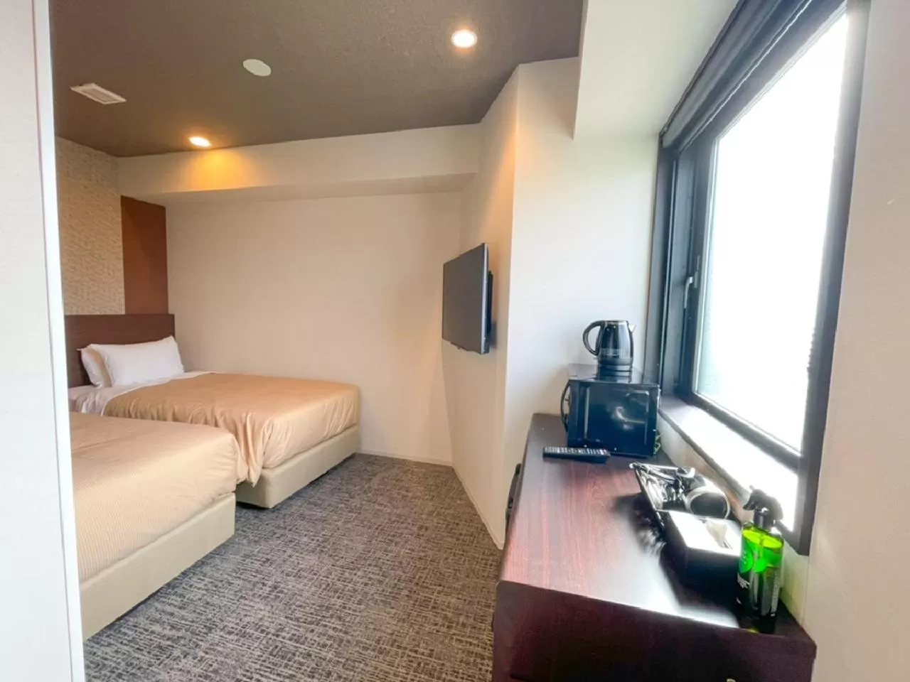 Bed in HOTEL LiVEMAX BUDGET Nagoya Shinkansen-guchi