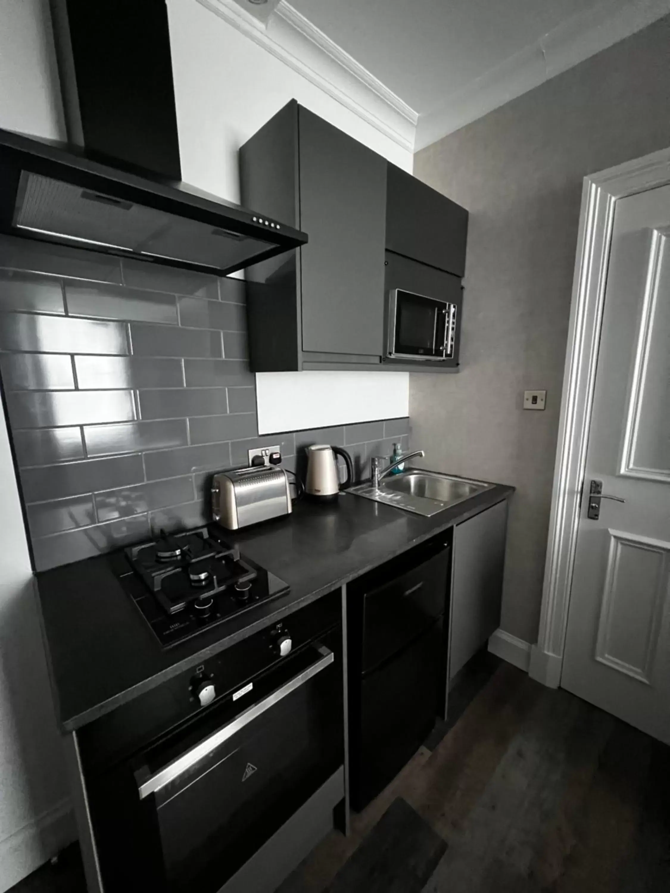 Kitchen/Kitchenette in Amani Apartments - Glasgow City Centre