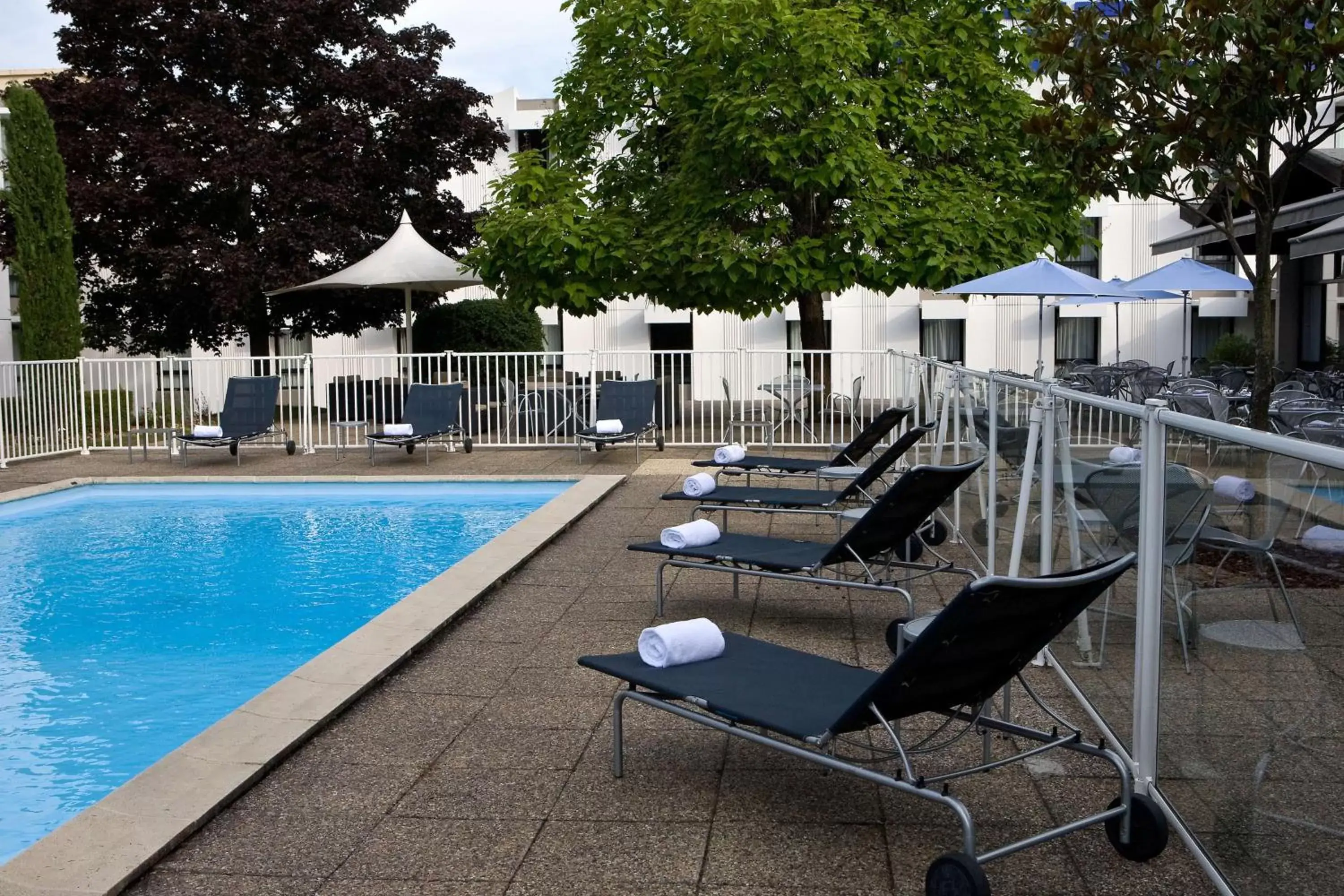 On site, Swimming Pool in Best Western Porte du Forez