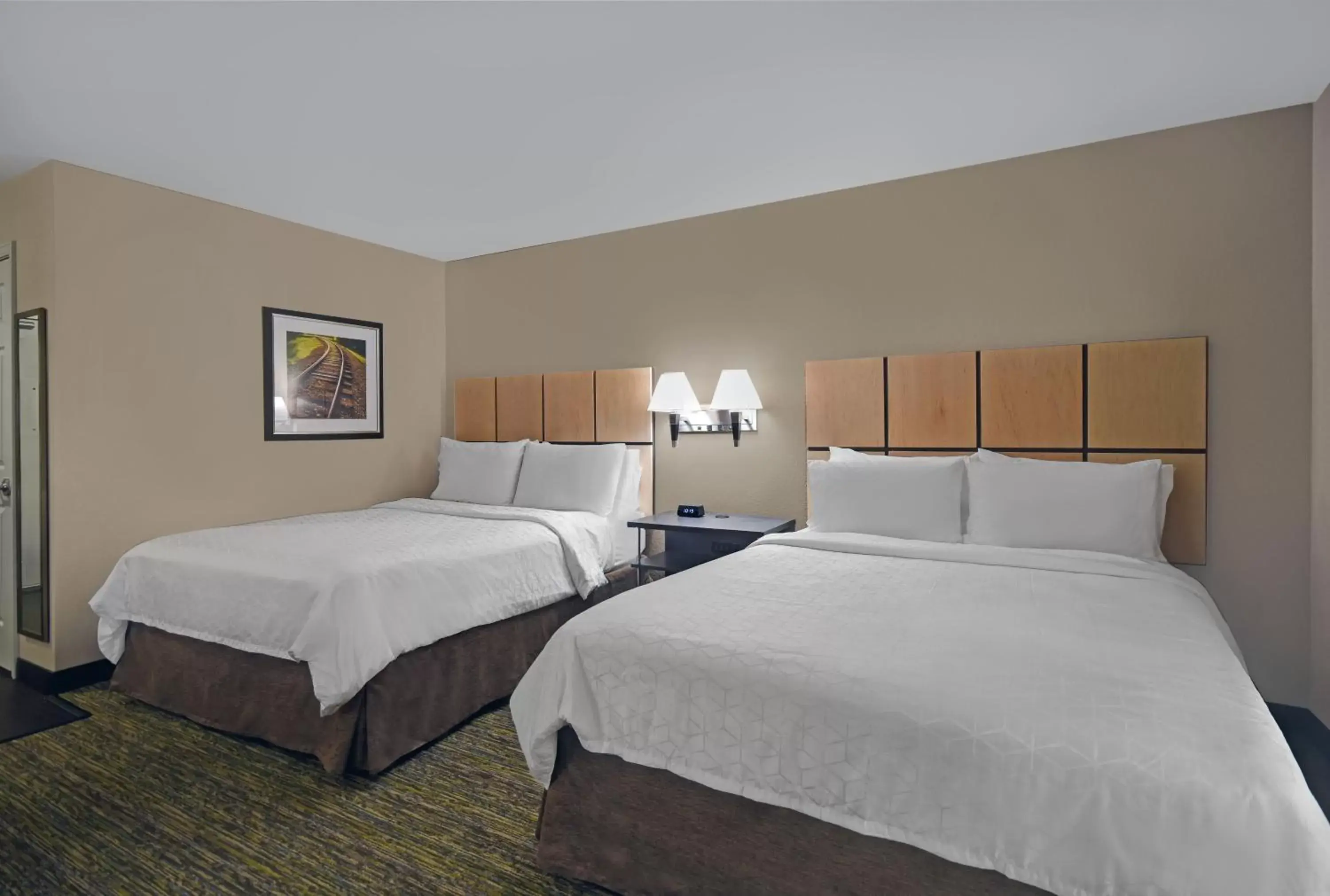 Photo of the whole room, Bed in Candlewood Suites Sumter, an IHG Hotel