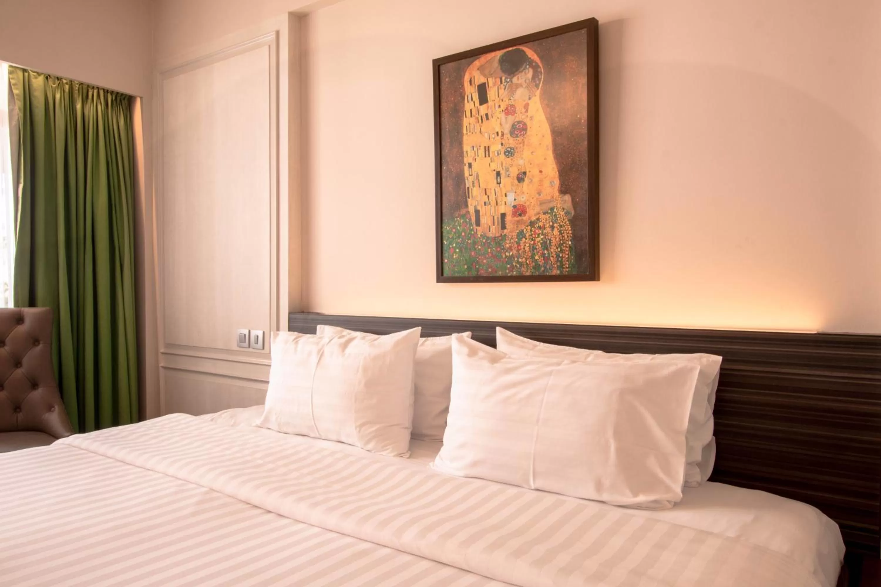 Bed in The Residence Rajtaevee Hotel