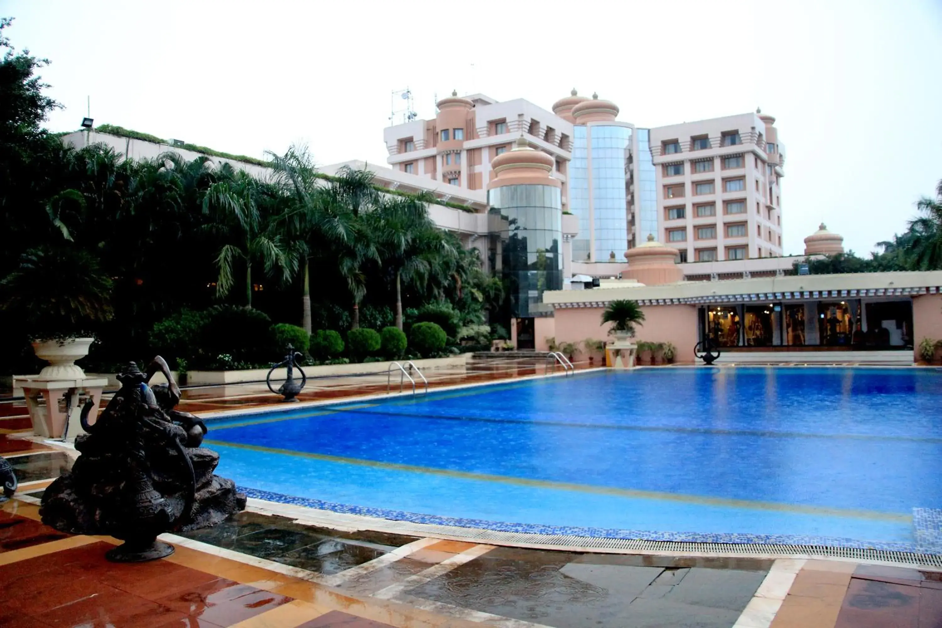 Facade/entrance, Swimming Pool in Hotel Swosti Premium Bhubaneswar