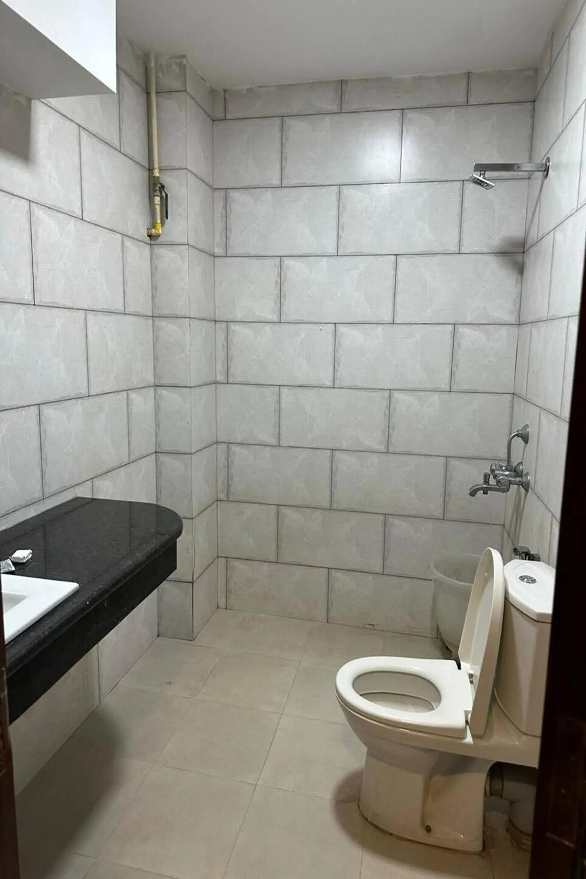Bathroom in Hotel Amenda International