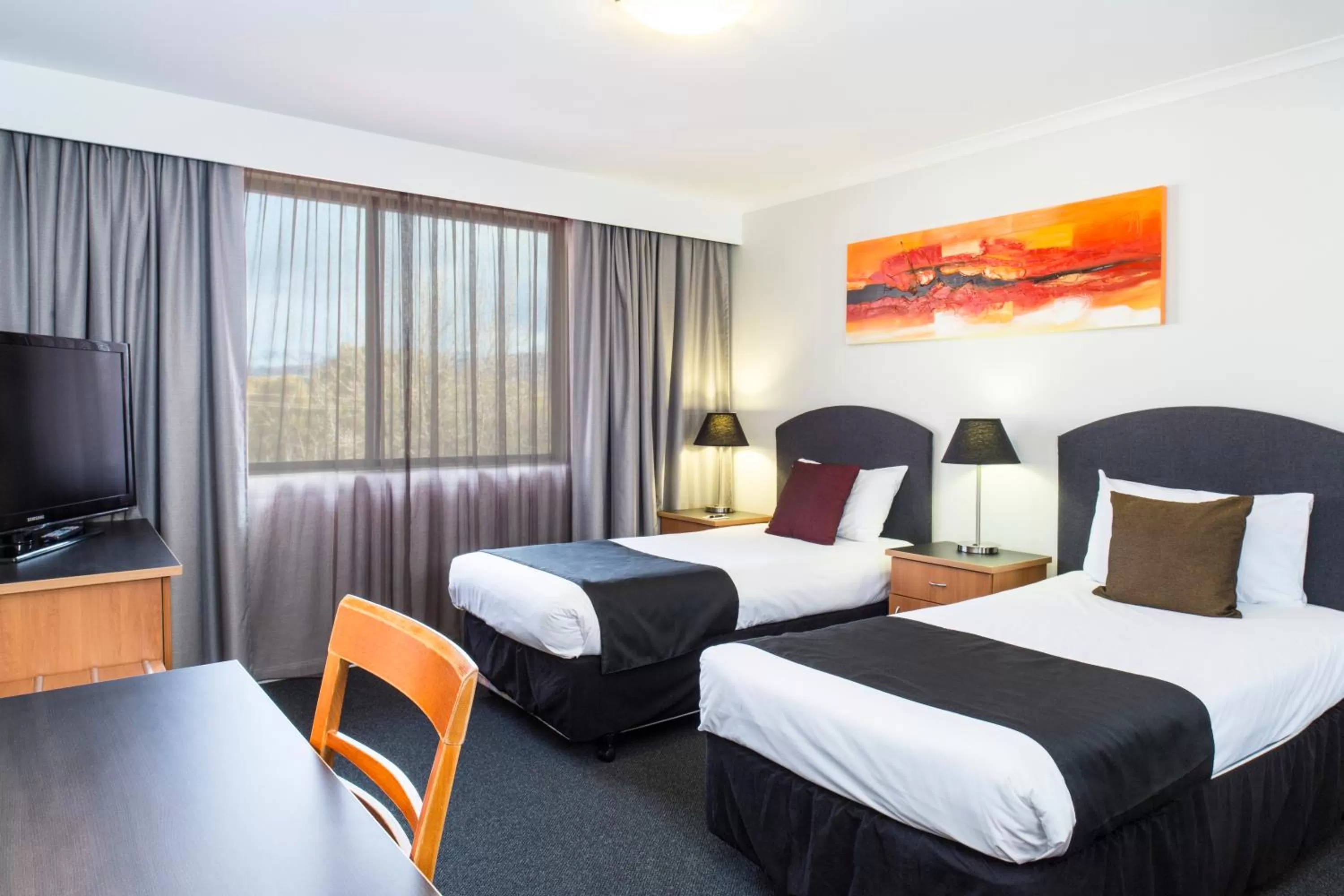 Bed in Alpha Hotel Canberra