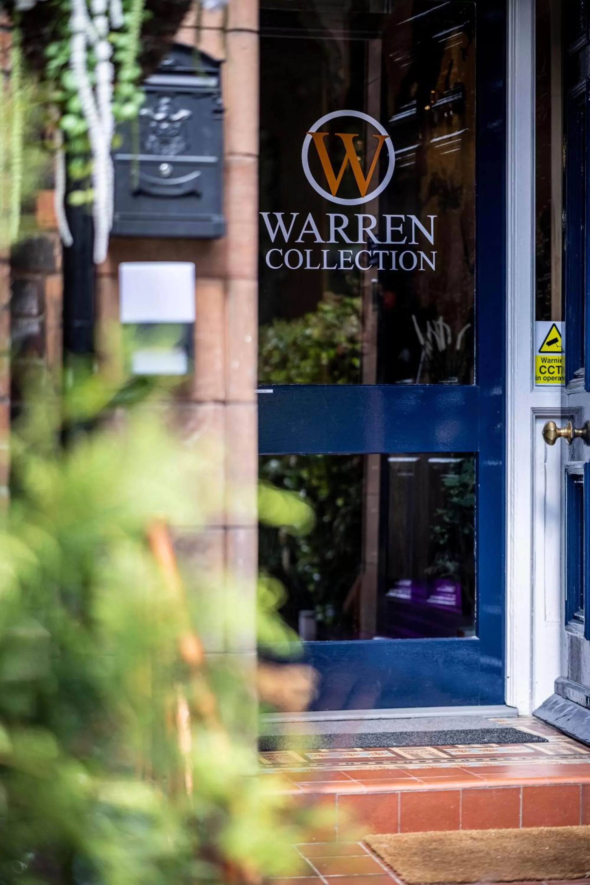 Property logo or sign in Number 11 by the Warren Collection