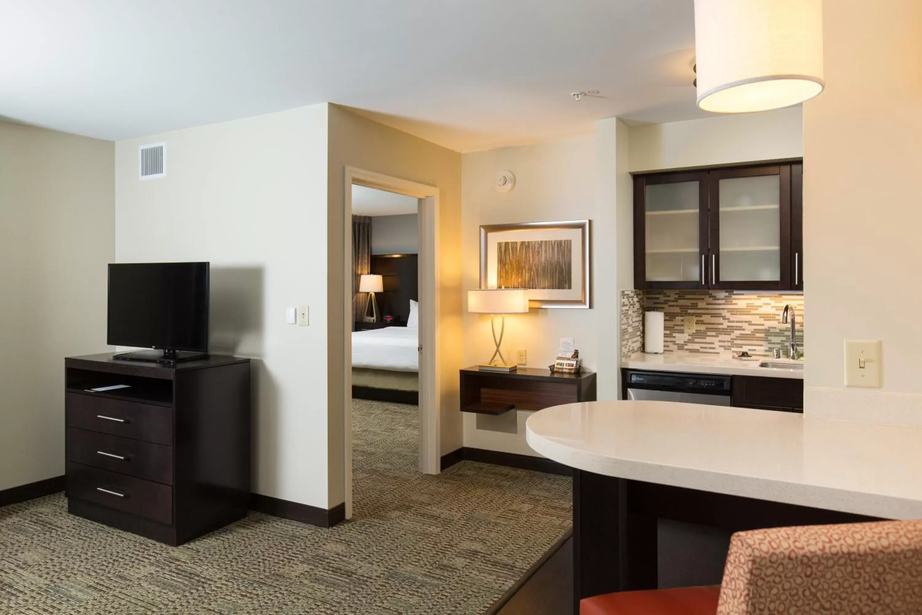 Photo of the whole room, TV/Entertainment Center in Staybridge Suites Chandler, an IHG Hotel