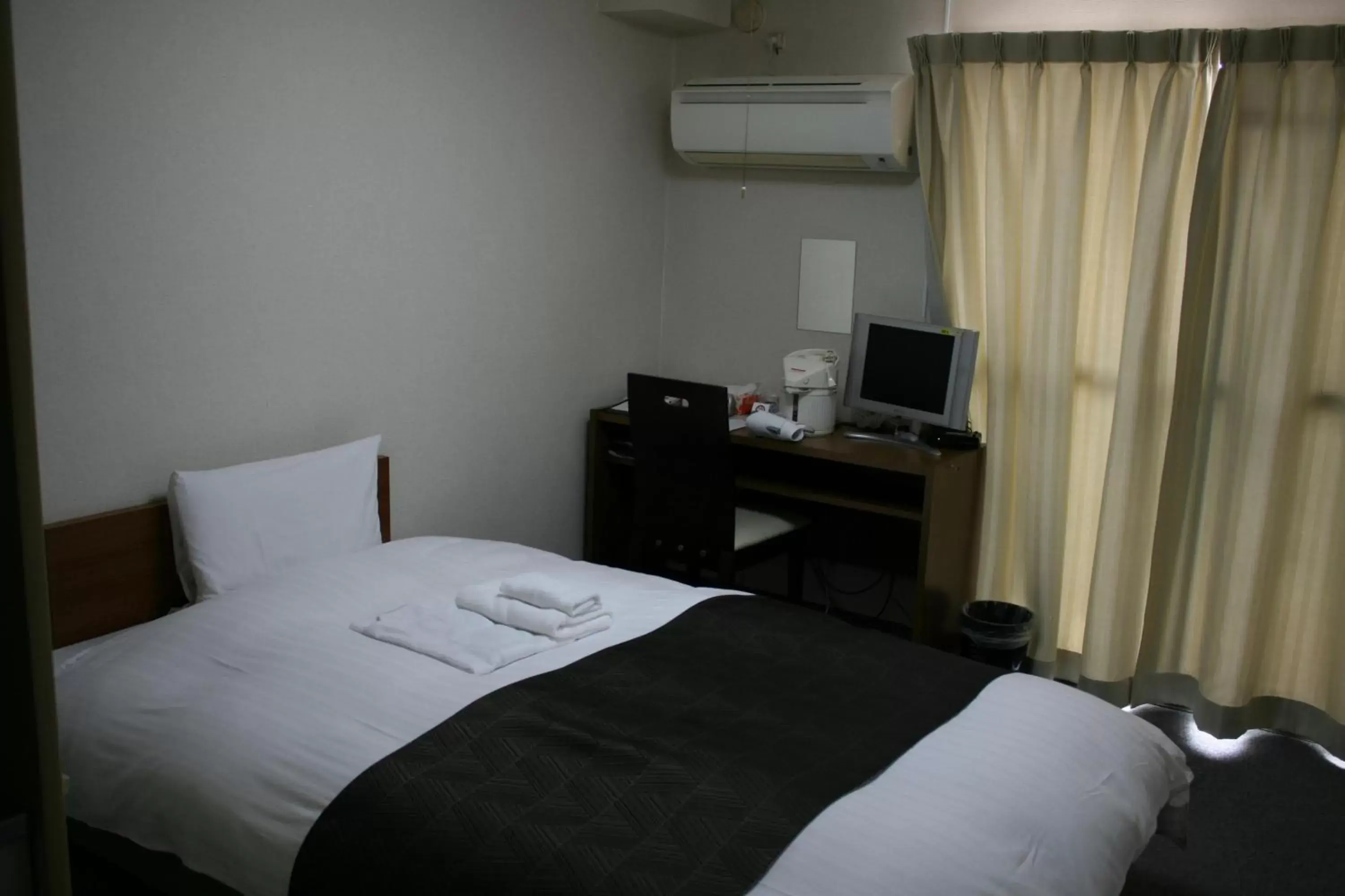 Bed in HOTEL CITY INN WAKAYAMA Wakayama-Ekimae