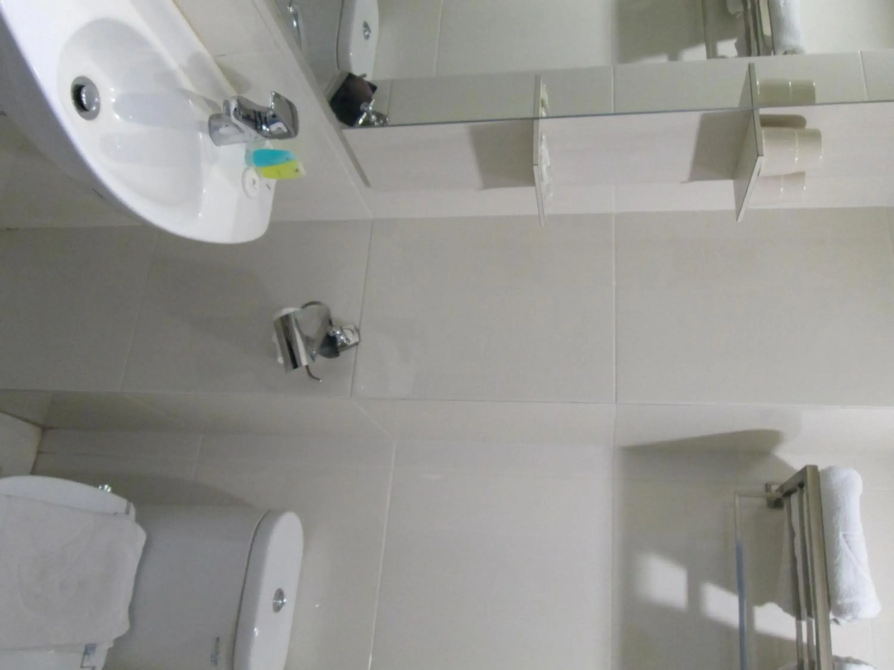 Bathroom in Vio Surapati - Managed By Dafam Hotels