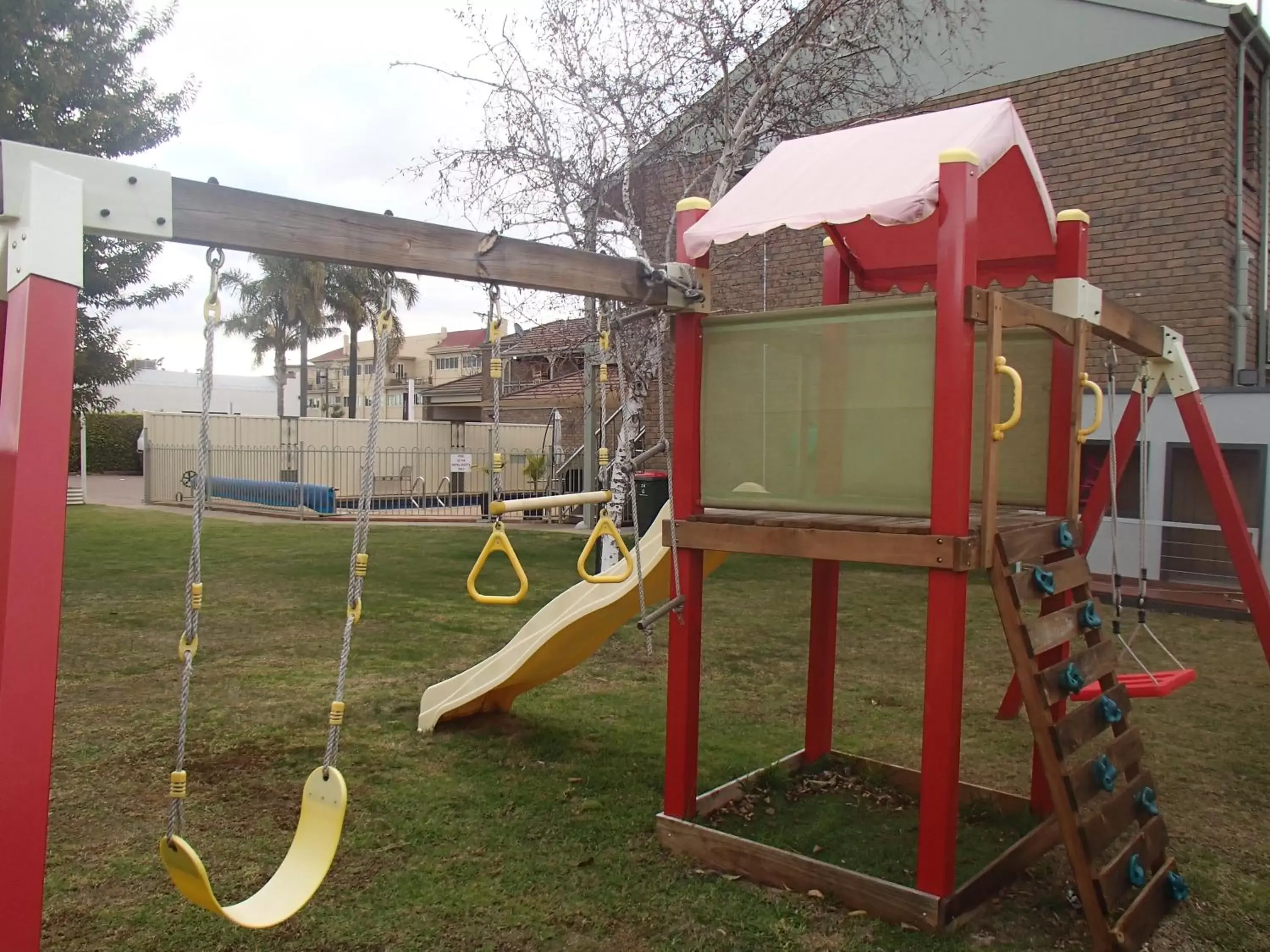 Children play ground, Children's Play Area in City Colonial Motor Inn