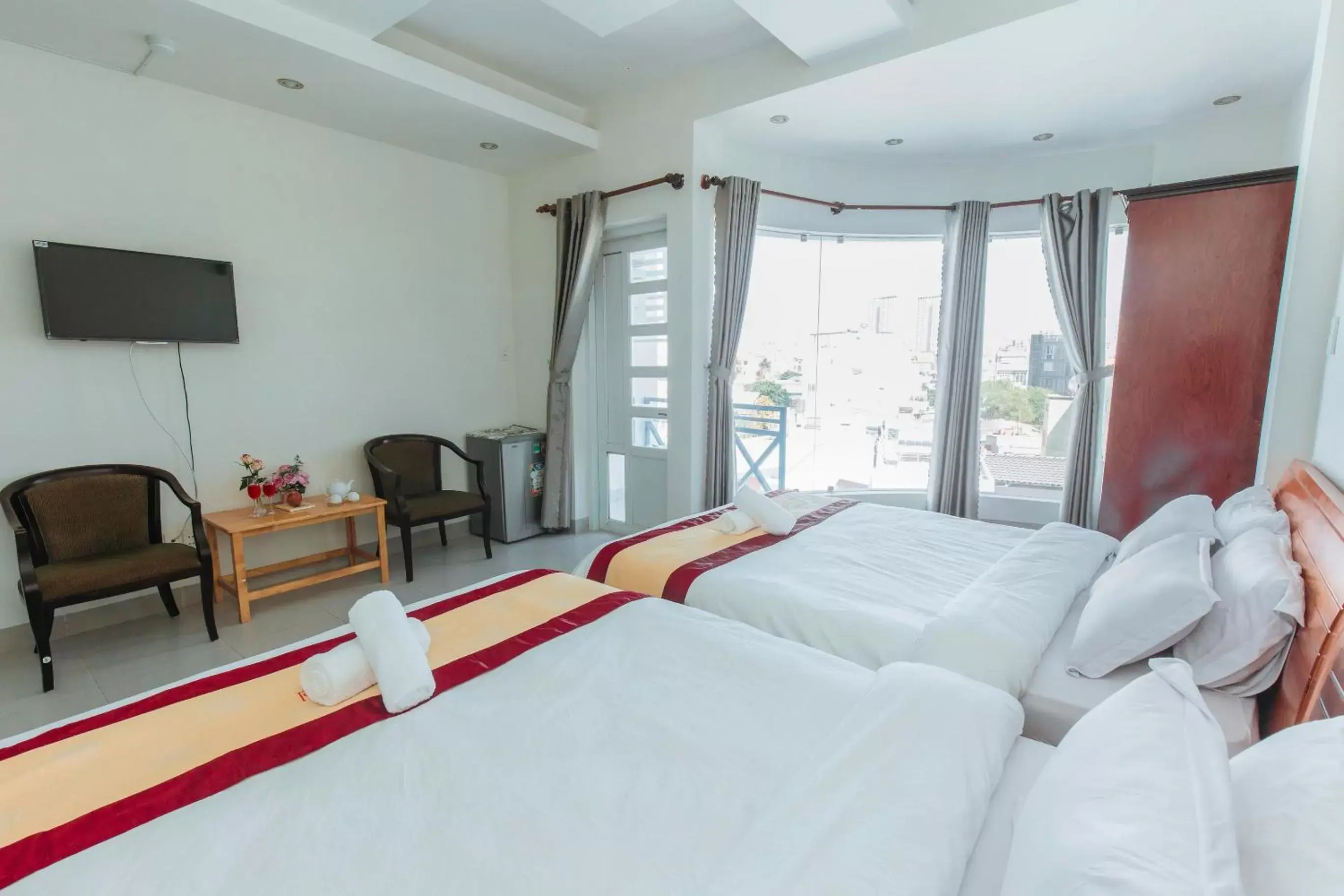Quadruple Room with Balcony in Phuoc Hai Hotel by The Moment Quadruple Room with Balcony in Phuoc Hai Hotel by The Moment
