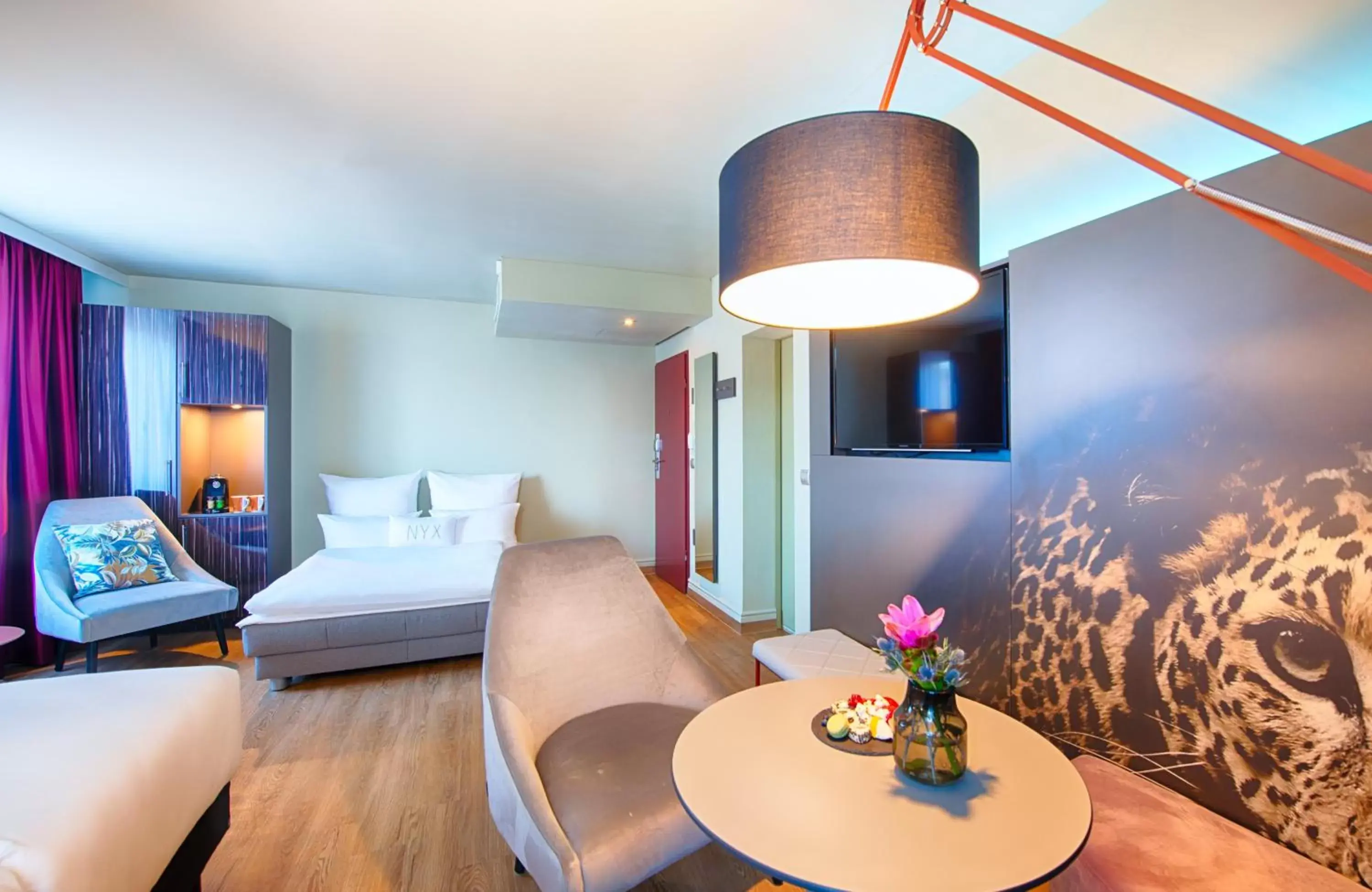 Photo of the whole room, Bed in NYX Hotel Mannheim by Leonardo Hotels