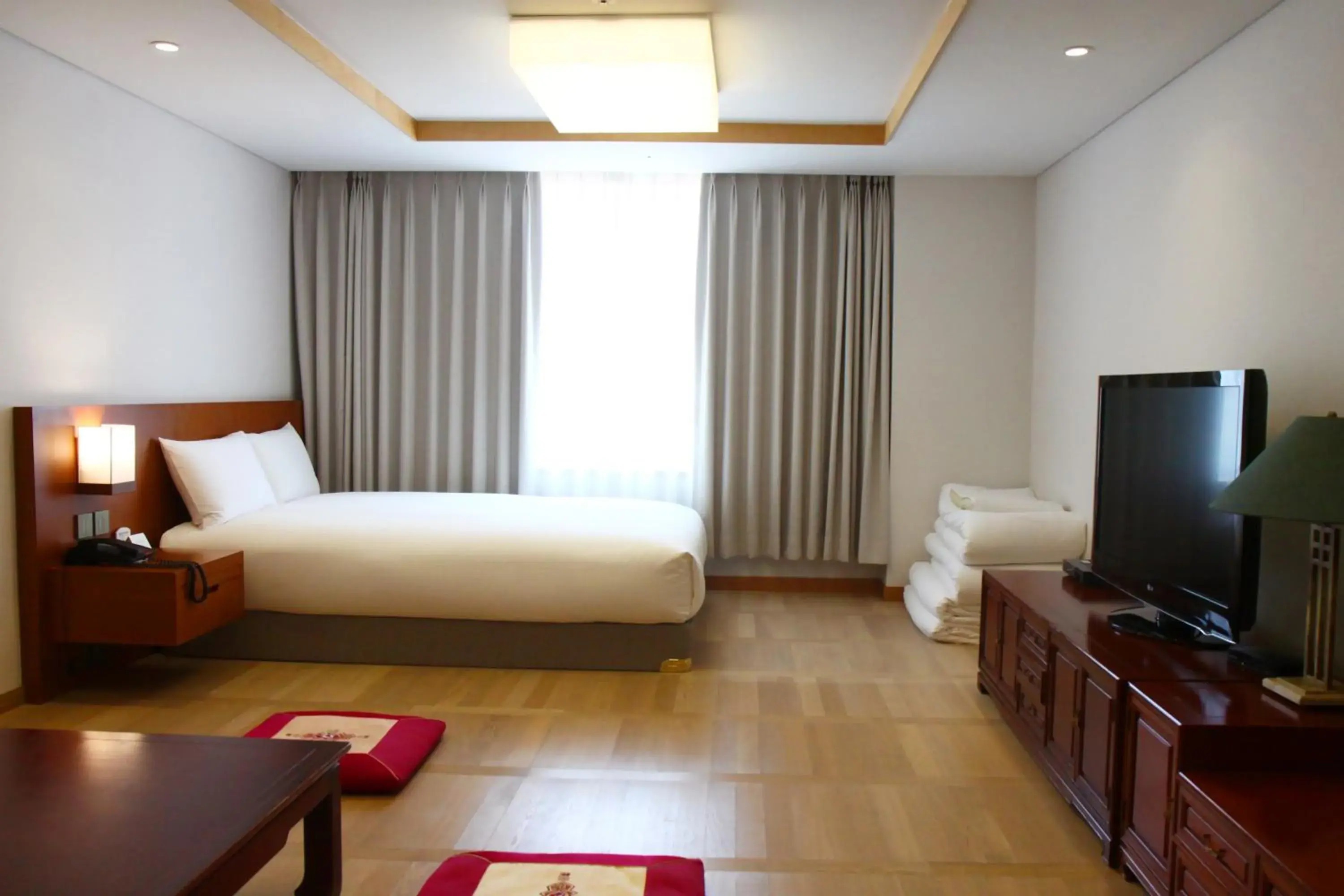 Bedroom, TV/Entertainment Center in MAISON GLAD JEJU