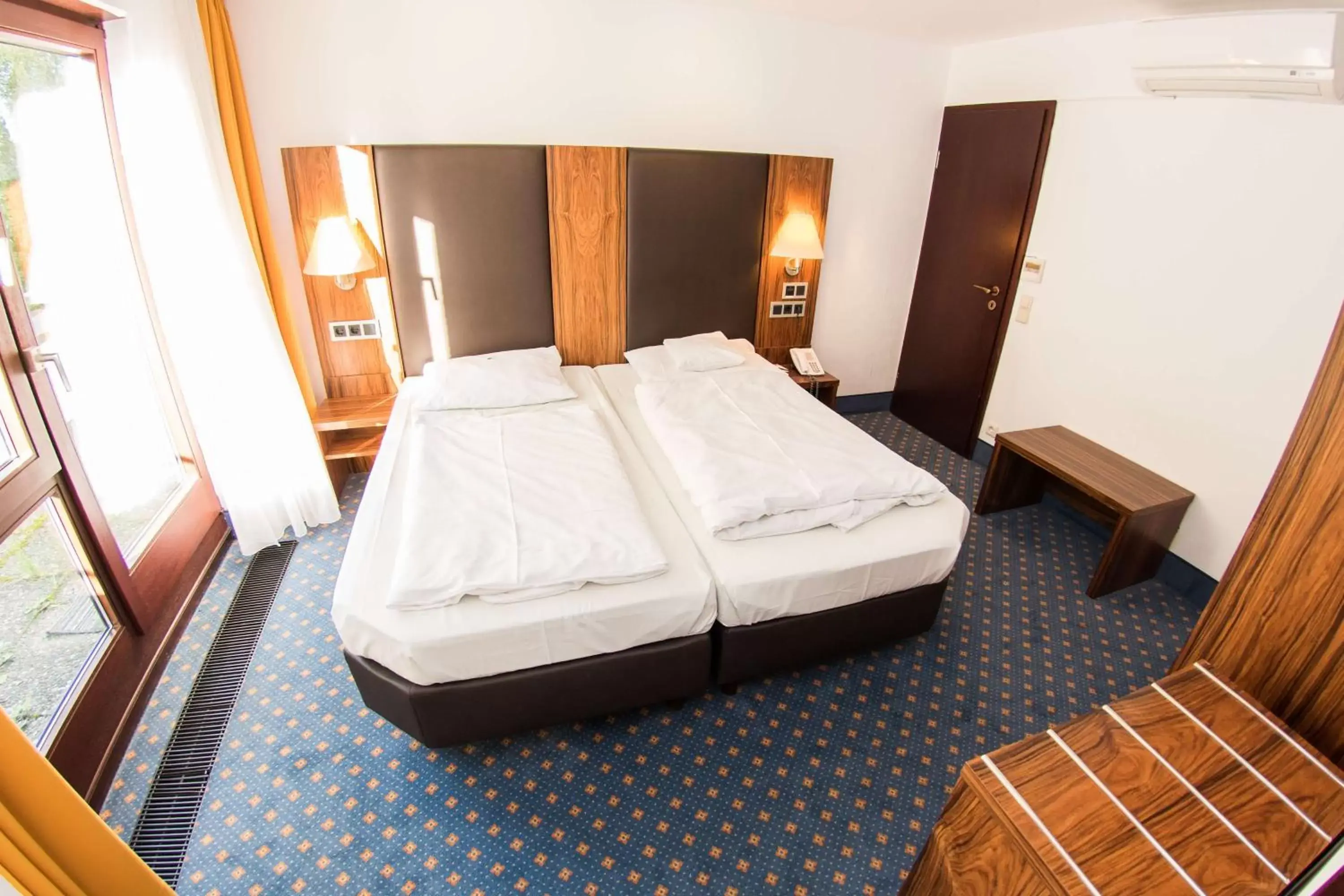 Photo of the whole room, Bed in Hotel Stuttgart 21