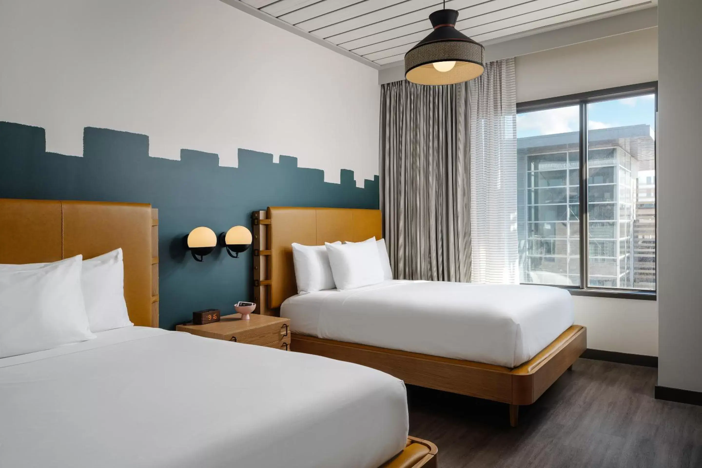 Bed in Origin Austin, a Wyndham Hotel
