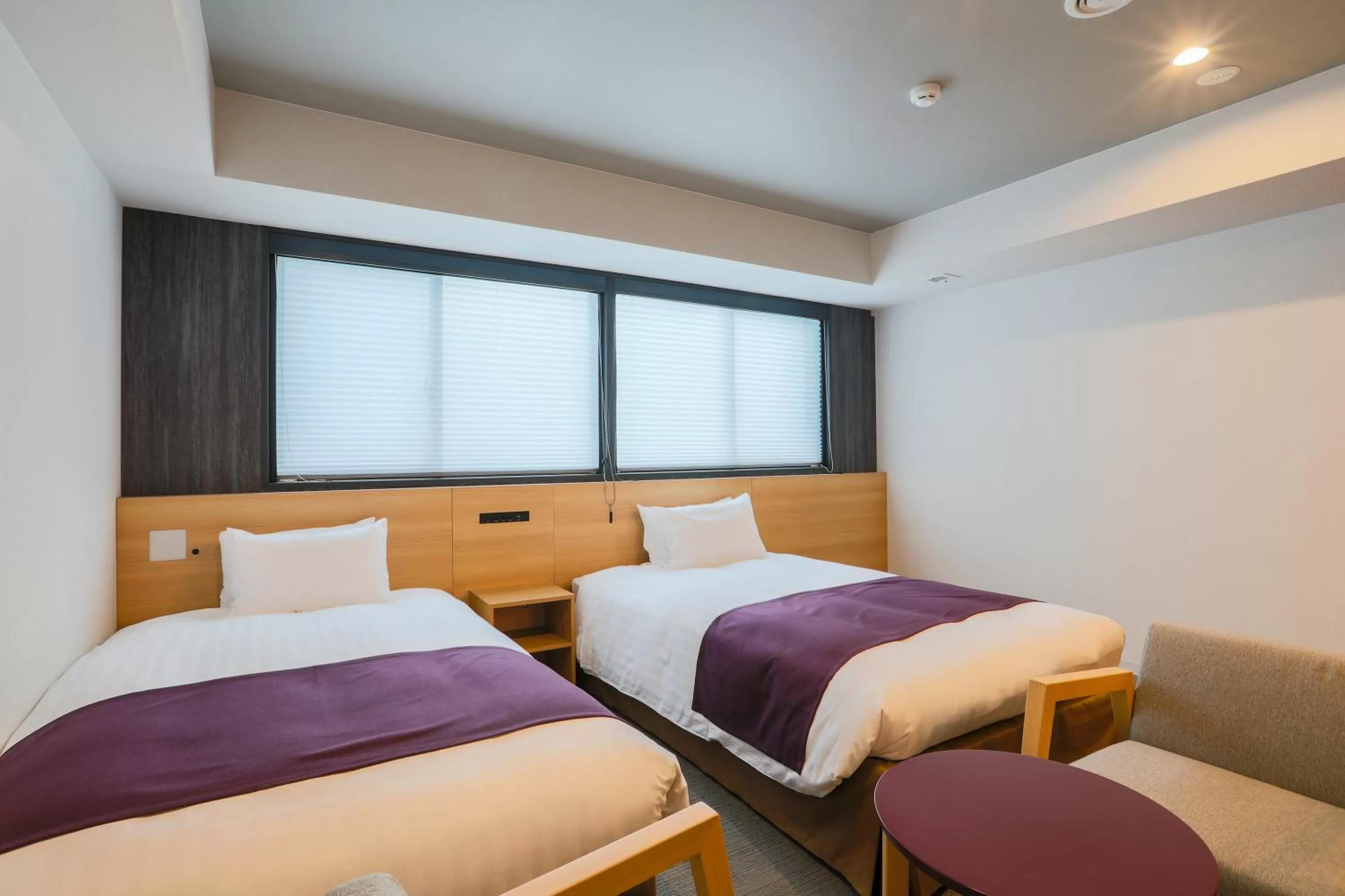 Photo of the whole room, Bed in KOKO HOTEL Kyoto Sanjo - formerly Hotel Wing International Premium Kyoto Sanjo