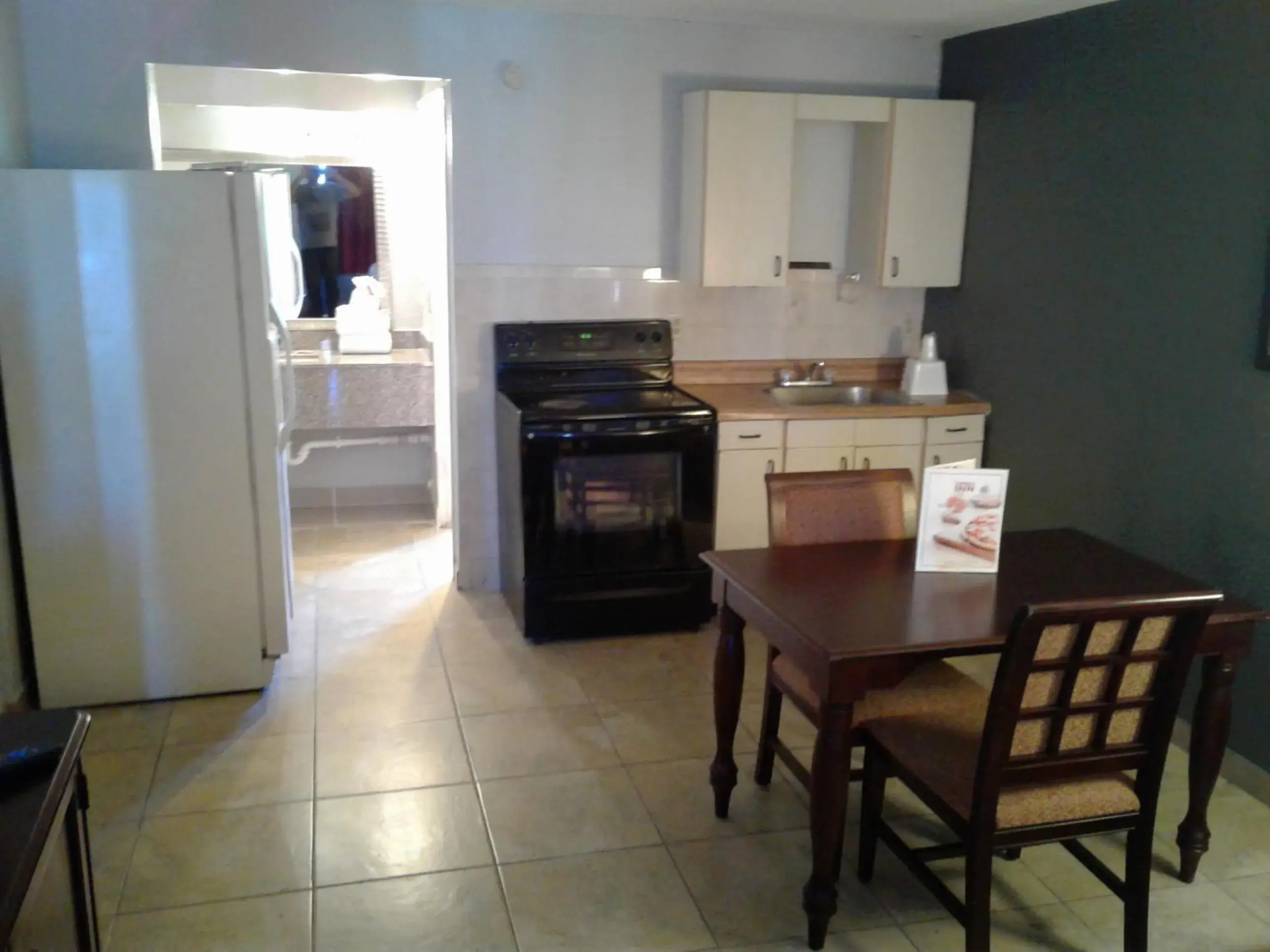 Kitchen/Kitchenette in Express Inn & Suites - 5 Miles from St Petersburg Clearwater Airport