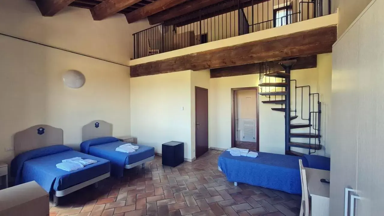 Bed in Borgo de' Varano by Hotel I Duchi