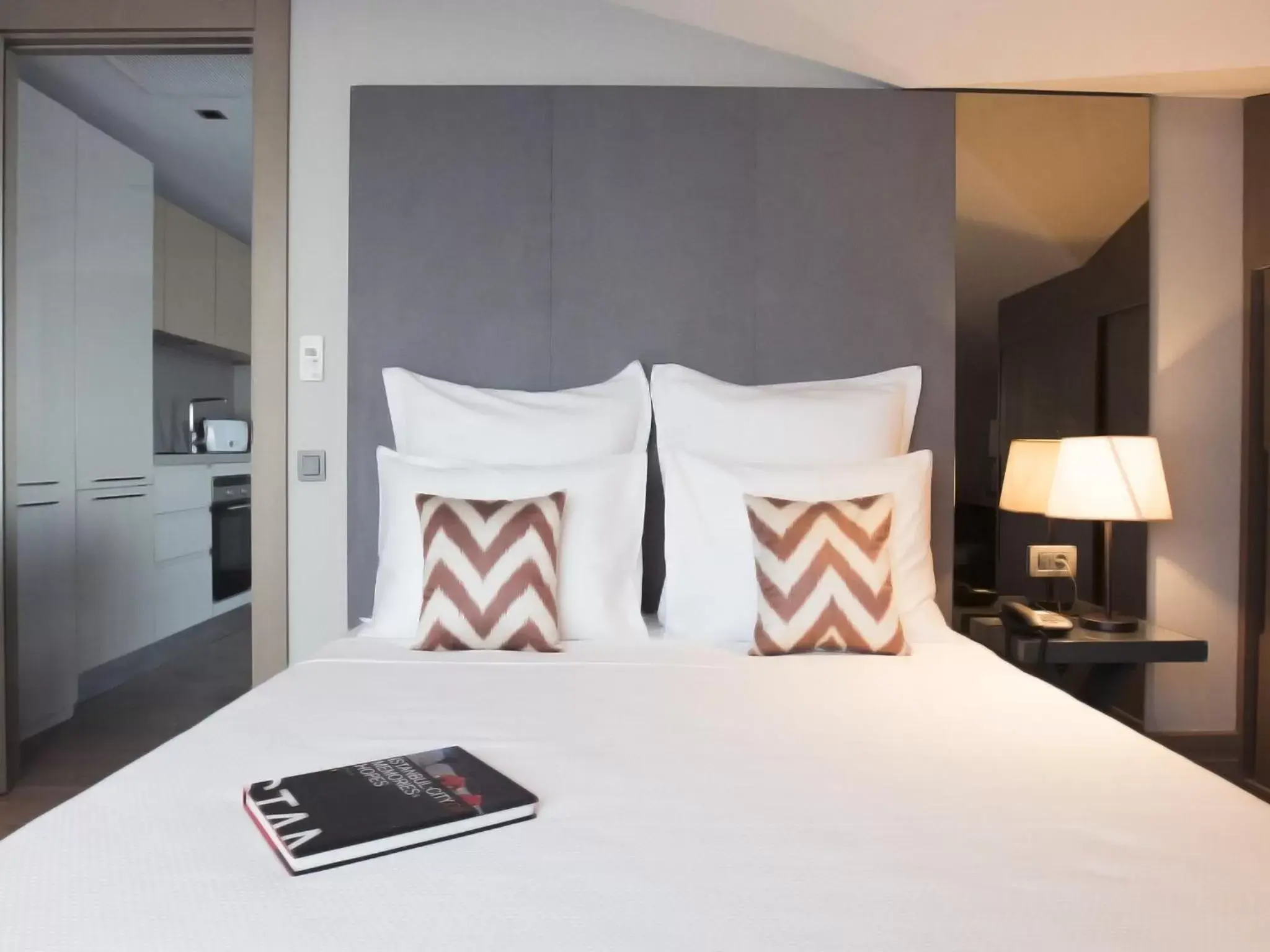 Bed in Sentire Hotels & Residences