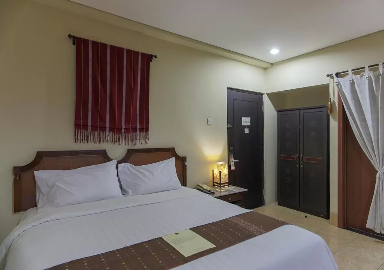 Bed in The Jayakarta Suites Komodo Flores