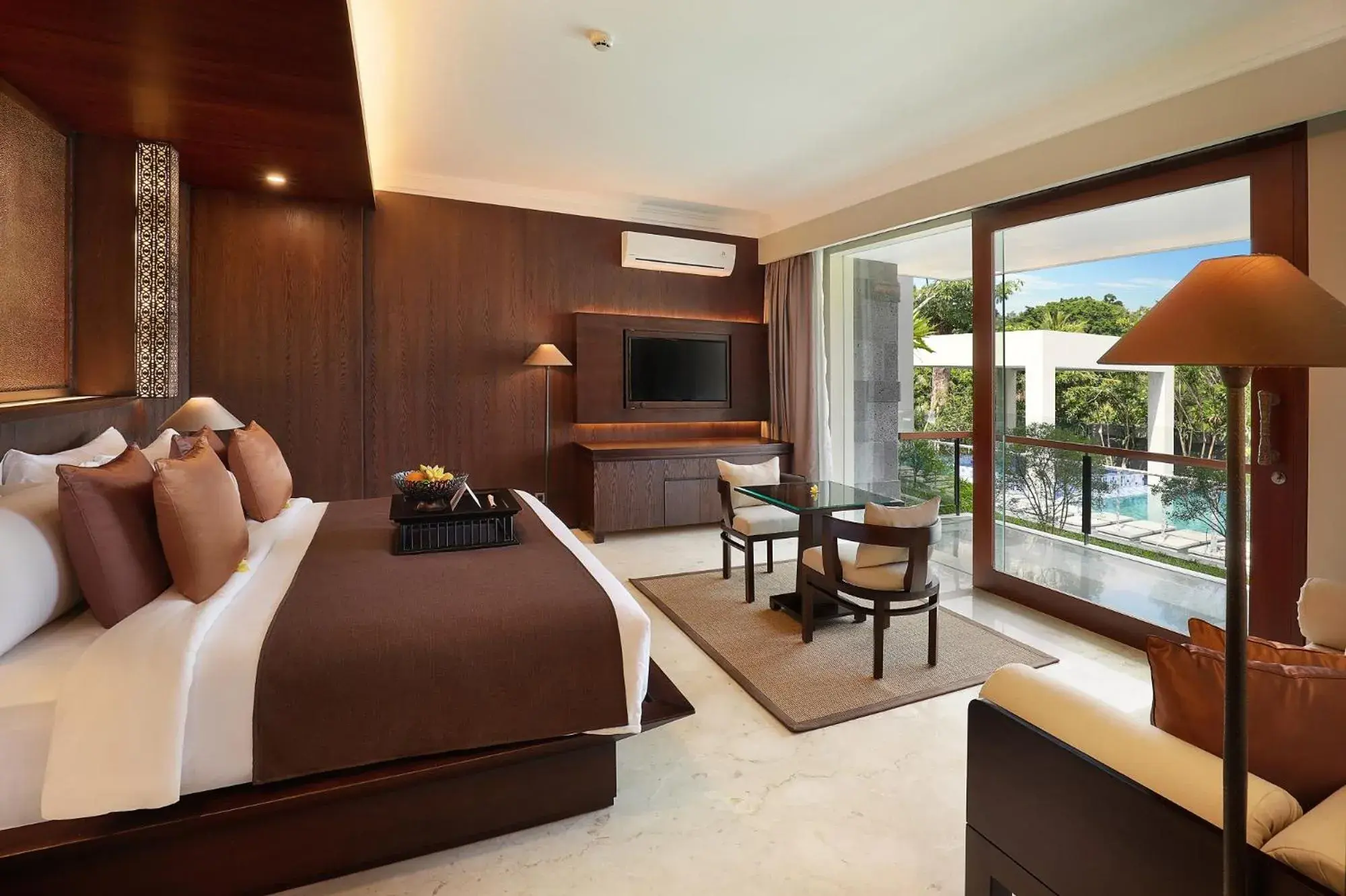 Bed in Royal Kamuela Villas & Suites at Monkey Forest Ubud