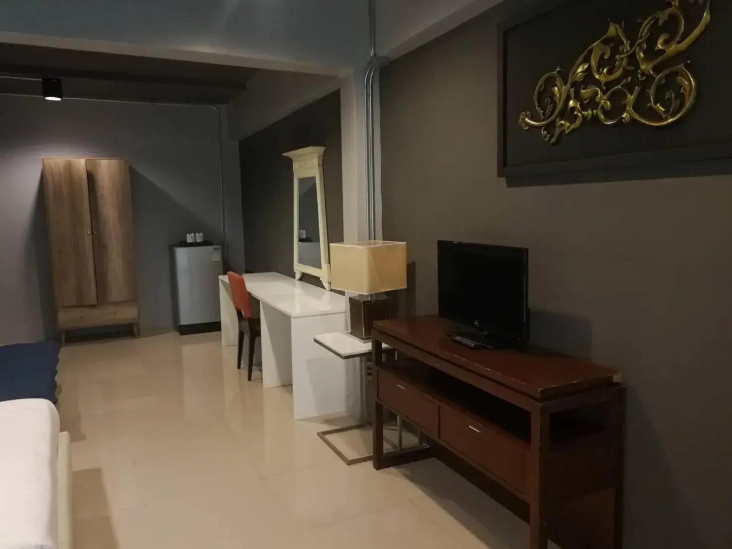 Bedroom, TV/Entertainment Center in Loft 21 Apartment Romklao