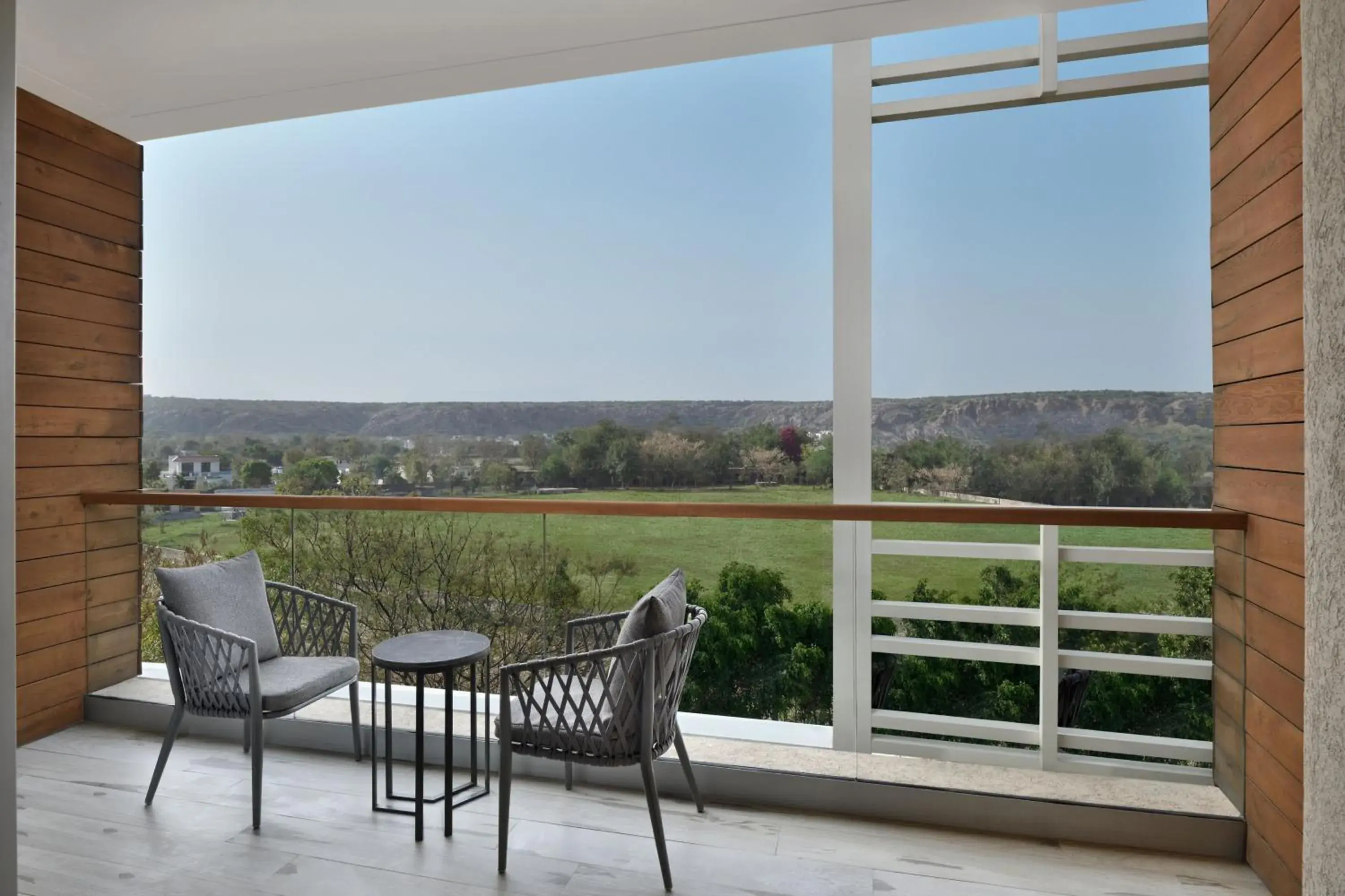 Photo of the whole room in Courtyard by Marriott Aravali Resort